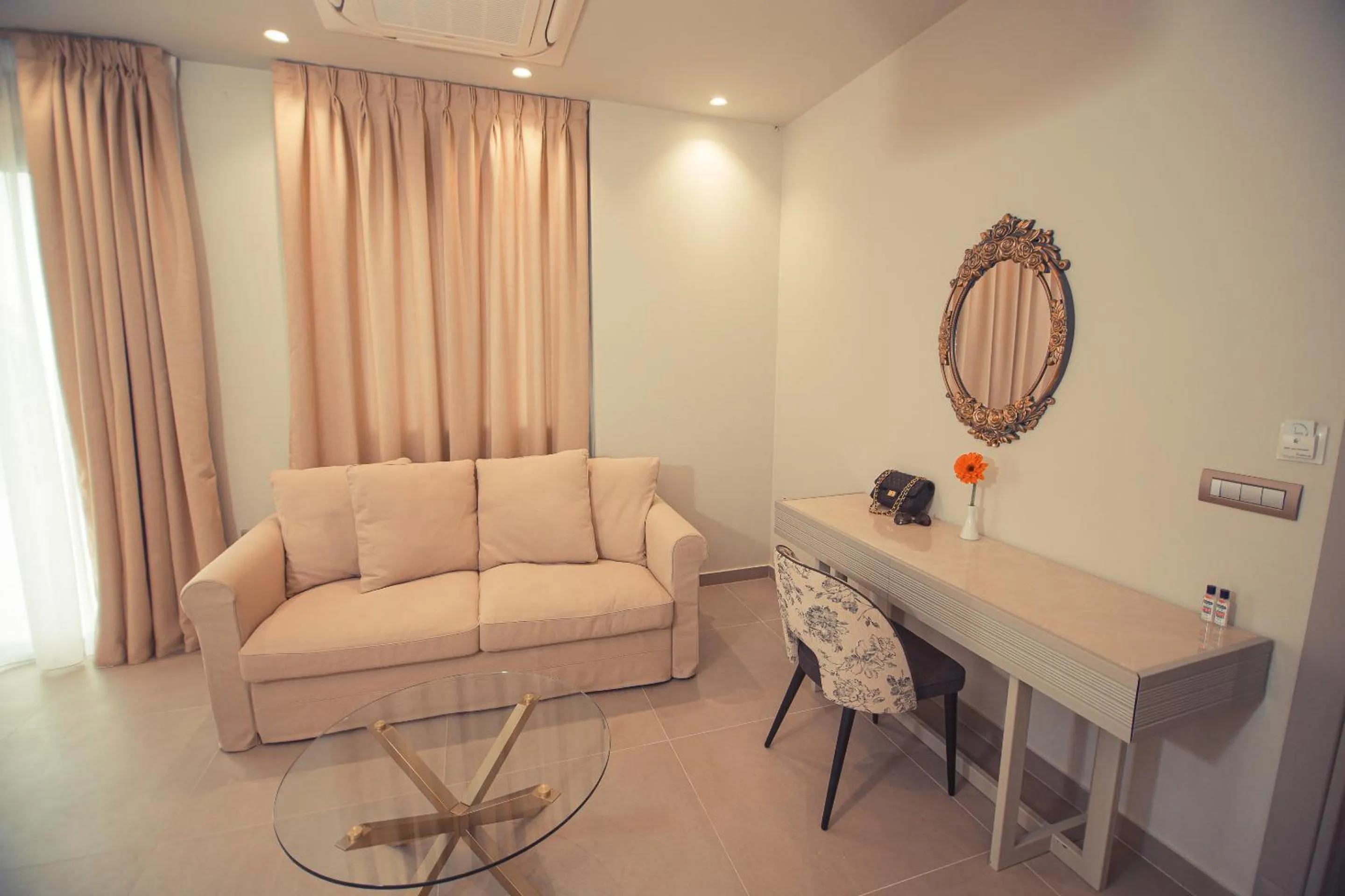 Seating area in IO Luxury Pool & Hot Tub Suites