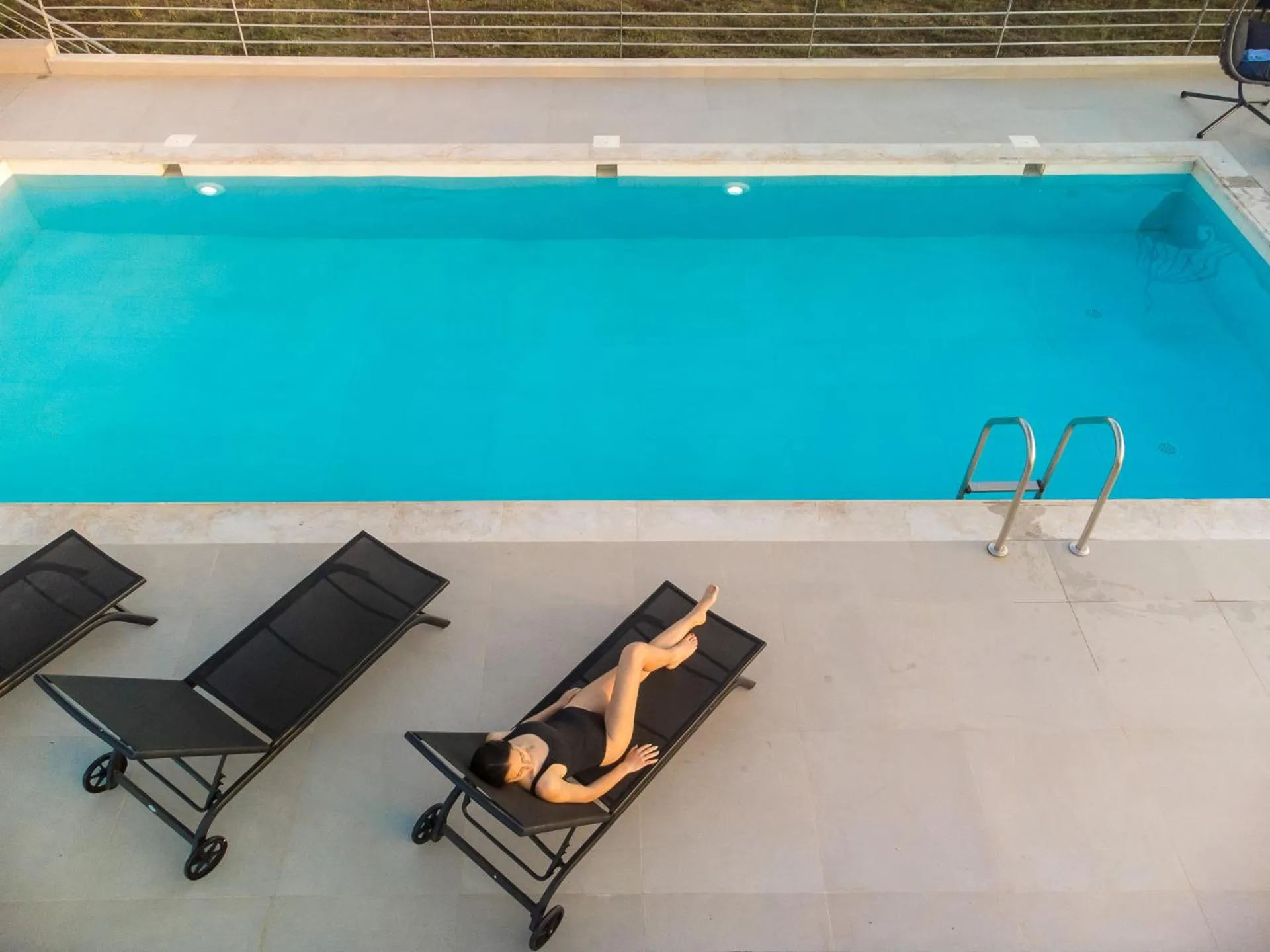 Swimming pool in IO Luxury Pool & Hot Tub Suites