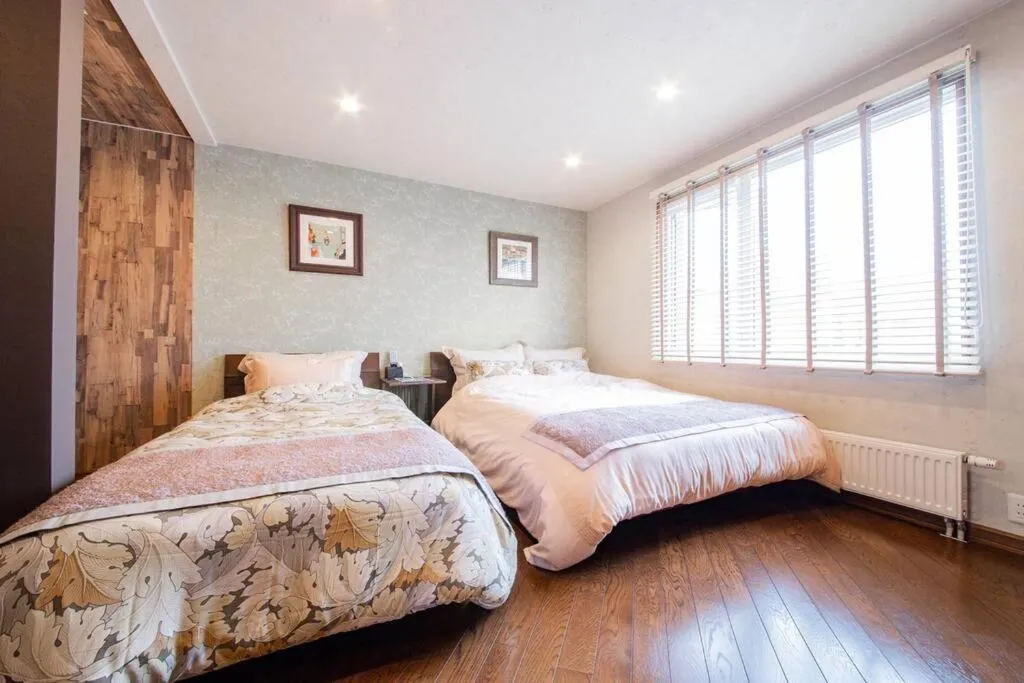 Bed in THE BLAUBAUM TOYA