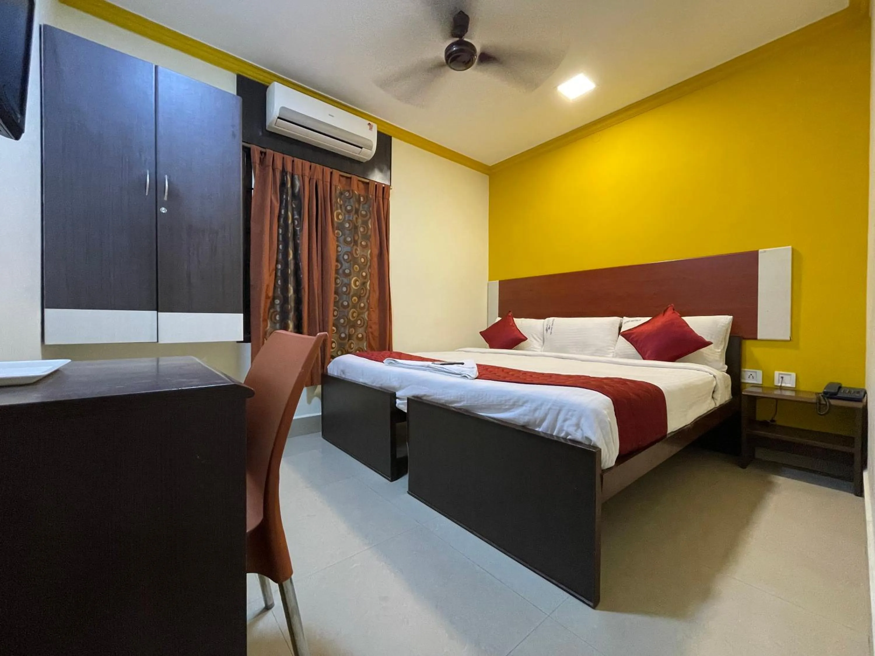 Photo of the whole room, Bed in Skyry Hotels Adyar