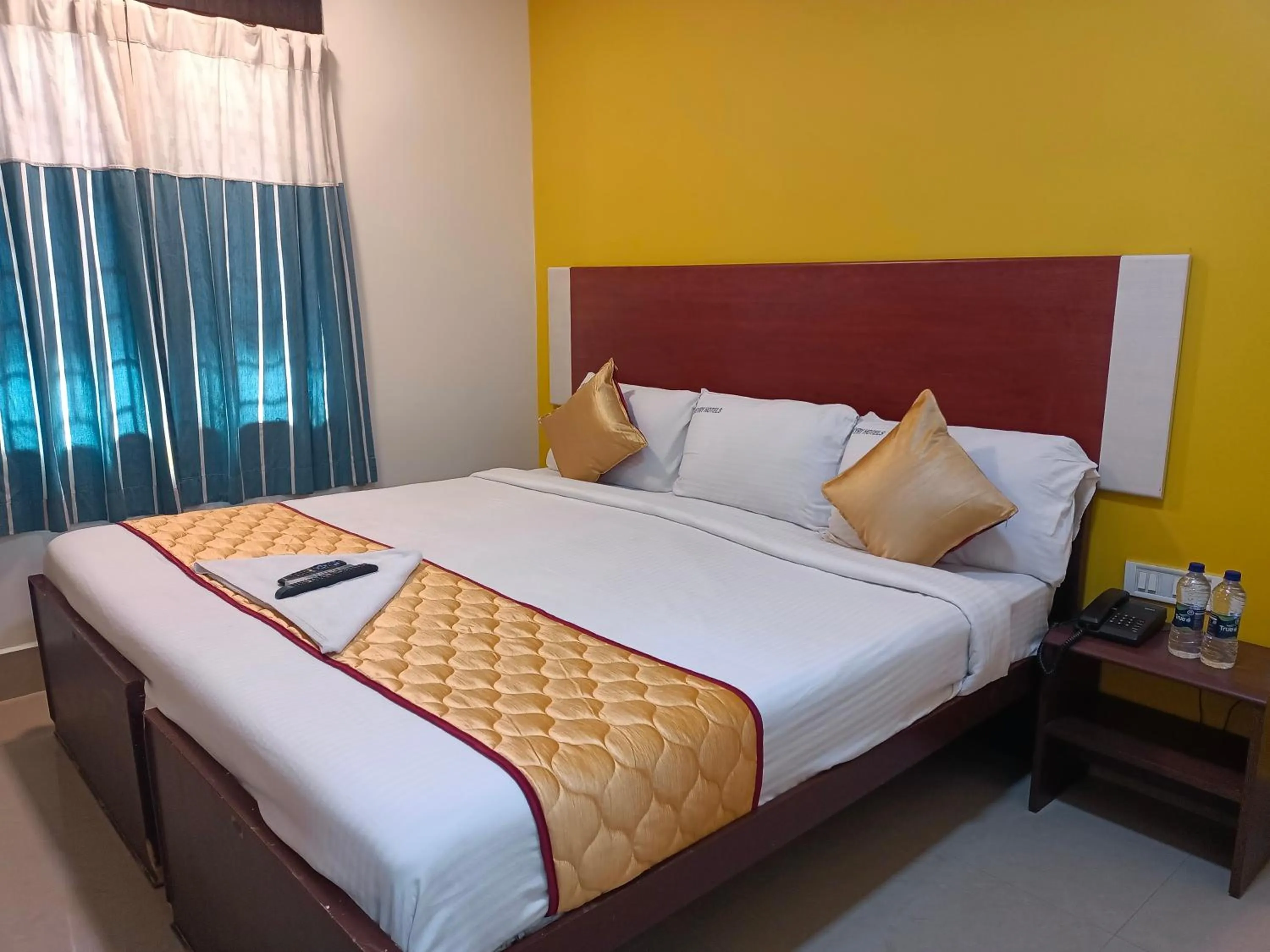 Bed in Skyry Hotels Adyar