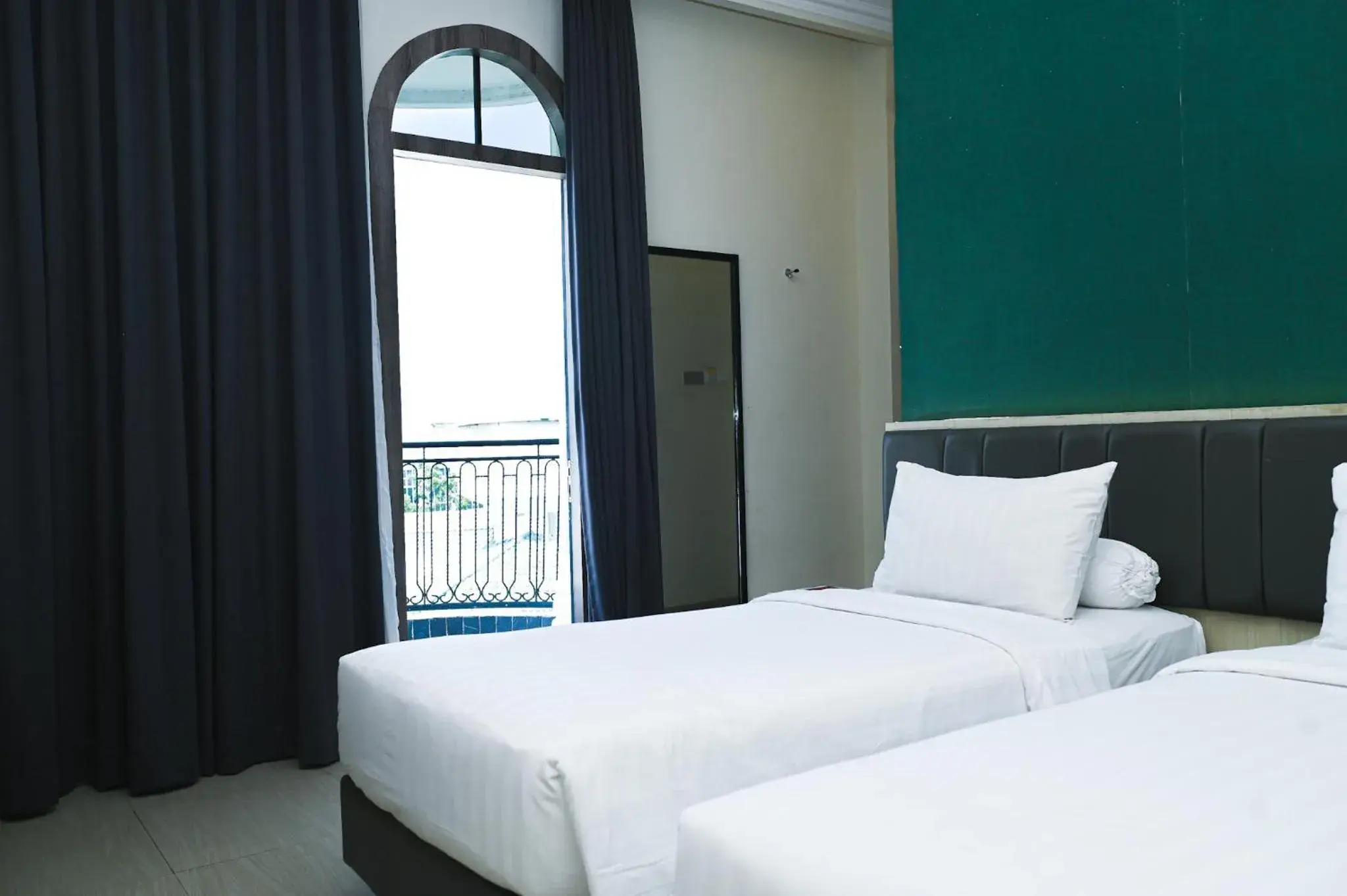 View (from property/room), Bed in Kesuma Front One Boutique Palembang View (from property/room), Bed in Kesuma Front One Boutique Palembang