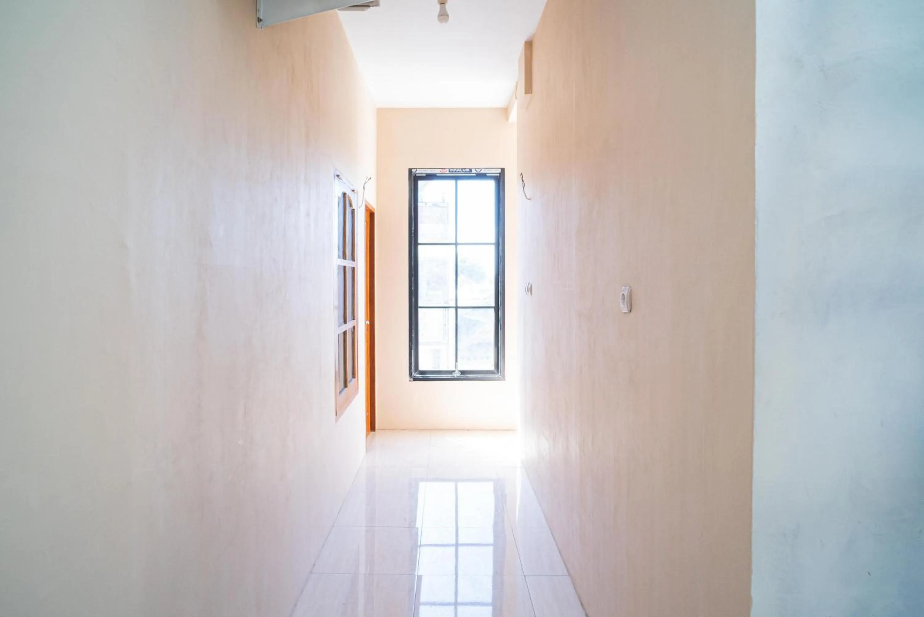 Property building in RedDoorz Syariah near Suramadu