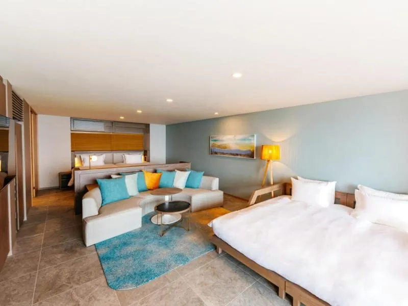 Living room, Bed in AQUASENSE Hotel & Resort