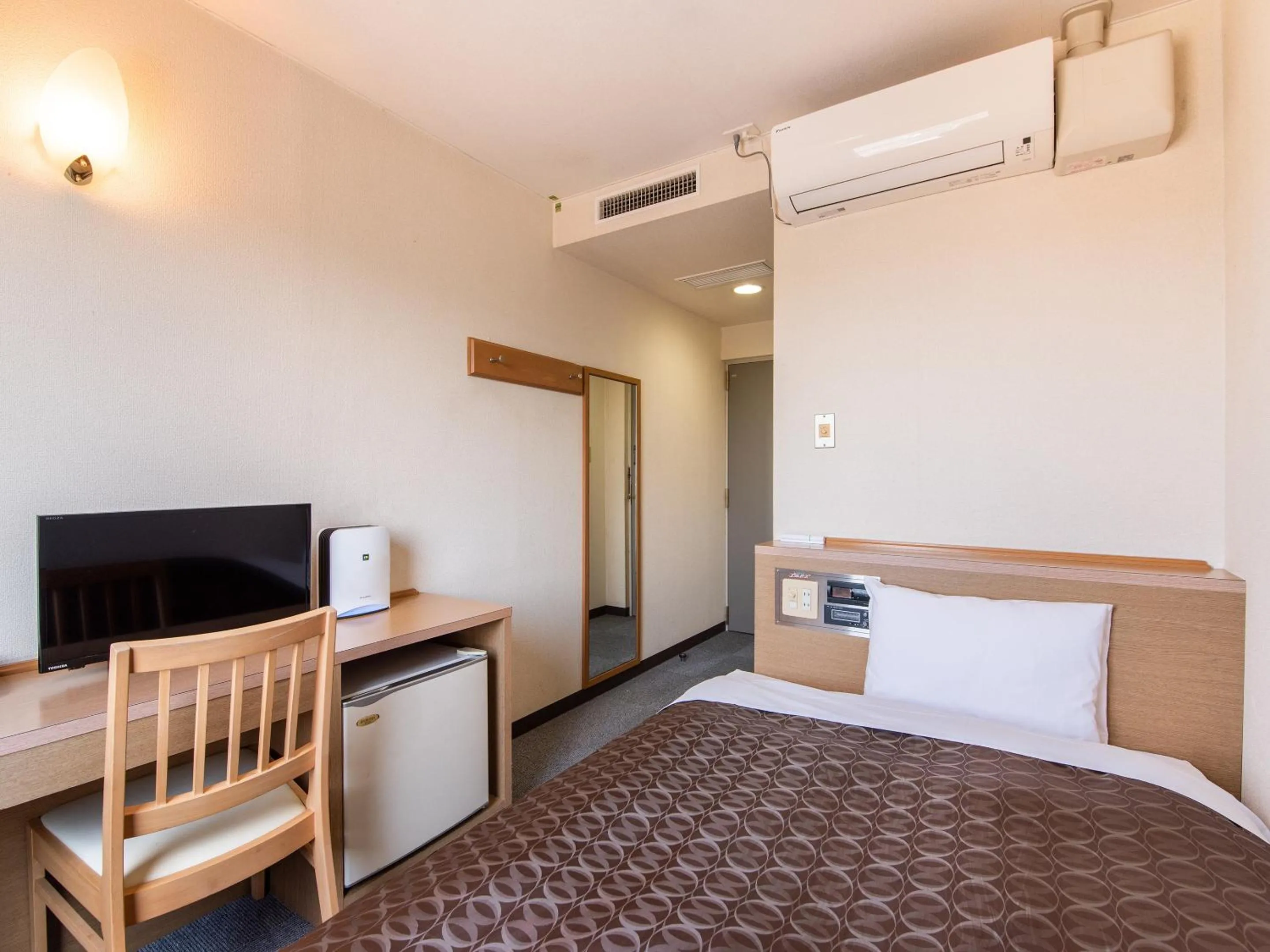 Photo of the whole room, Bed in Hotel Primrose Saito