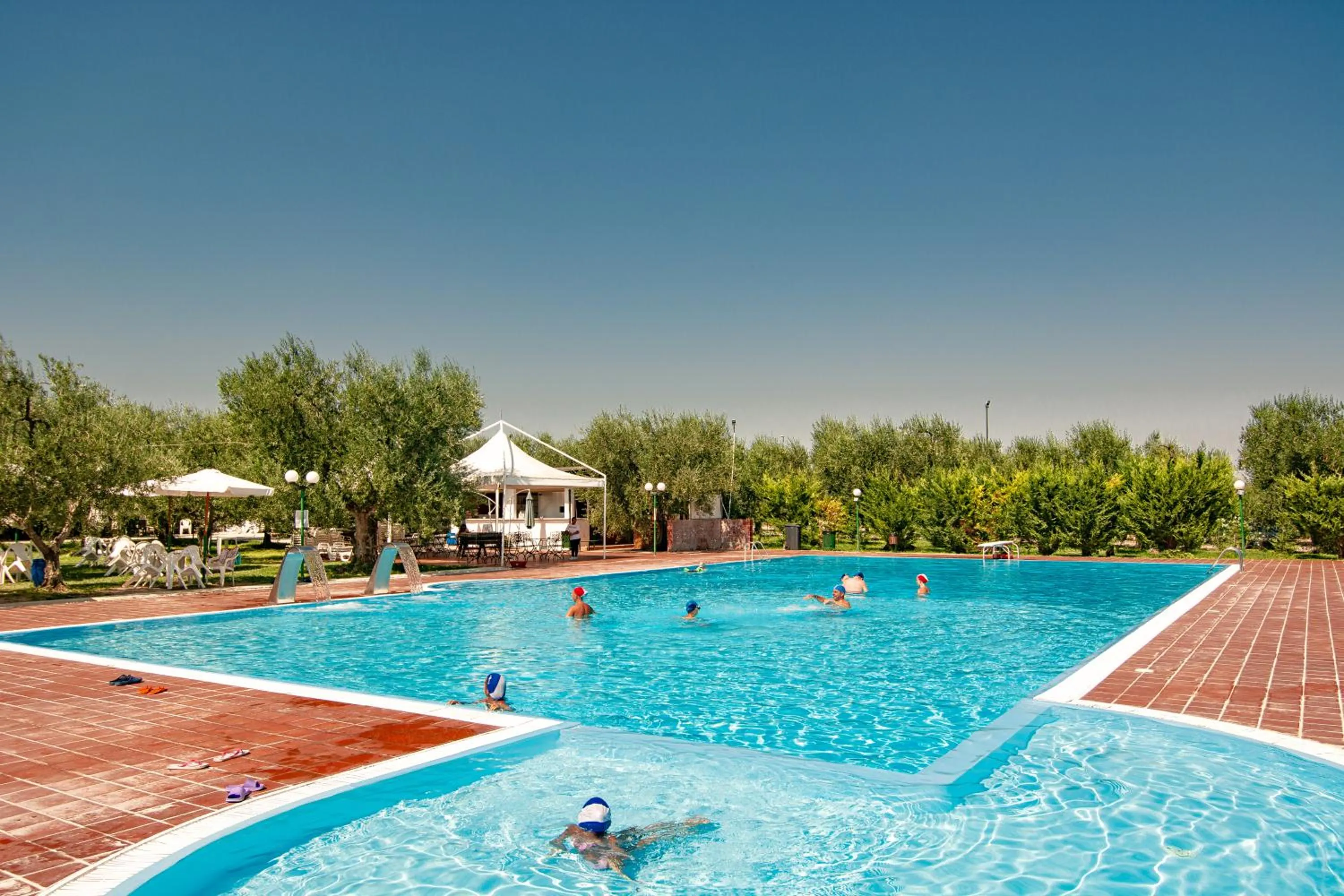Swimming pool in Giardino Degli Ulivi Resort Masseria