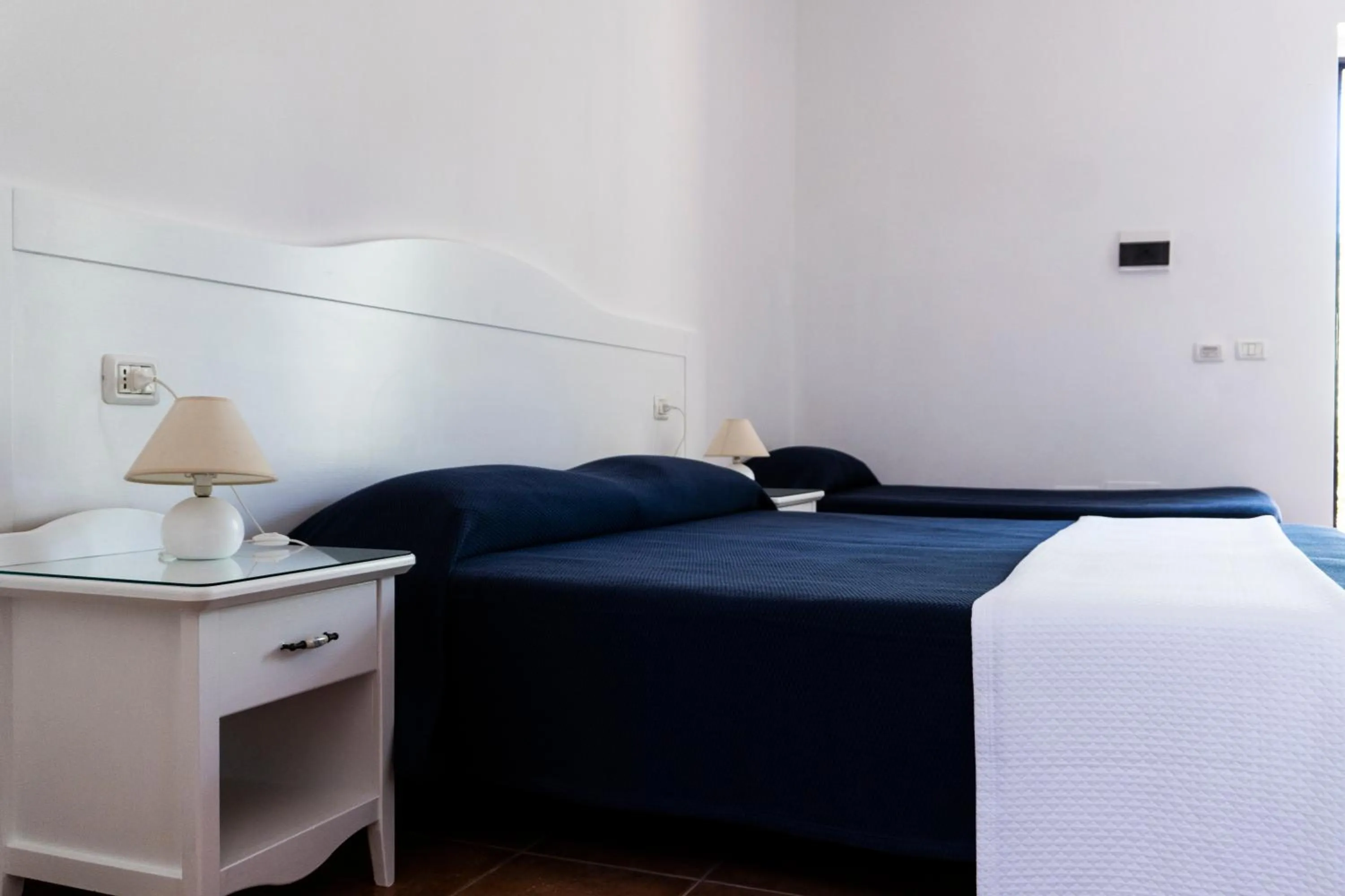 Bedroom in Giardino Degli Ulivi Resort Masseria
