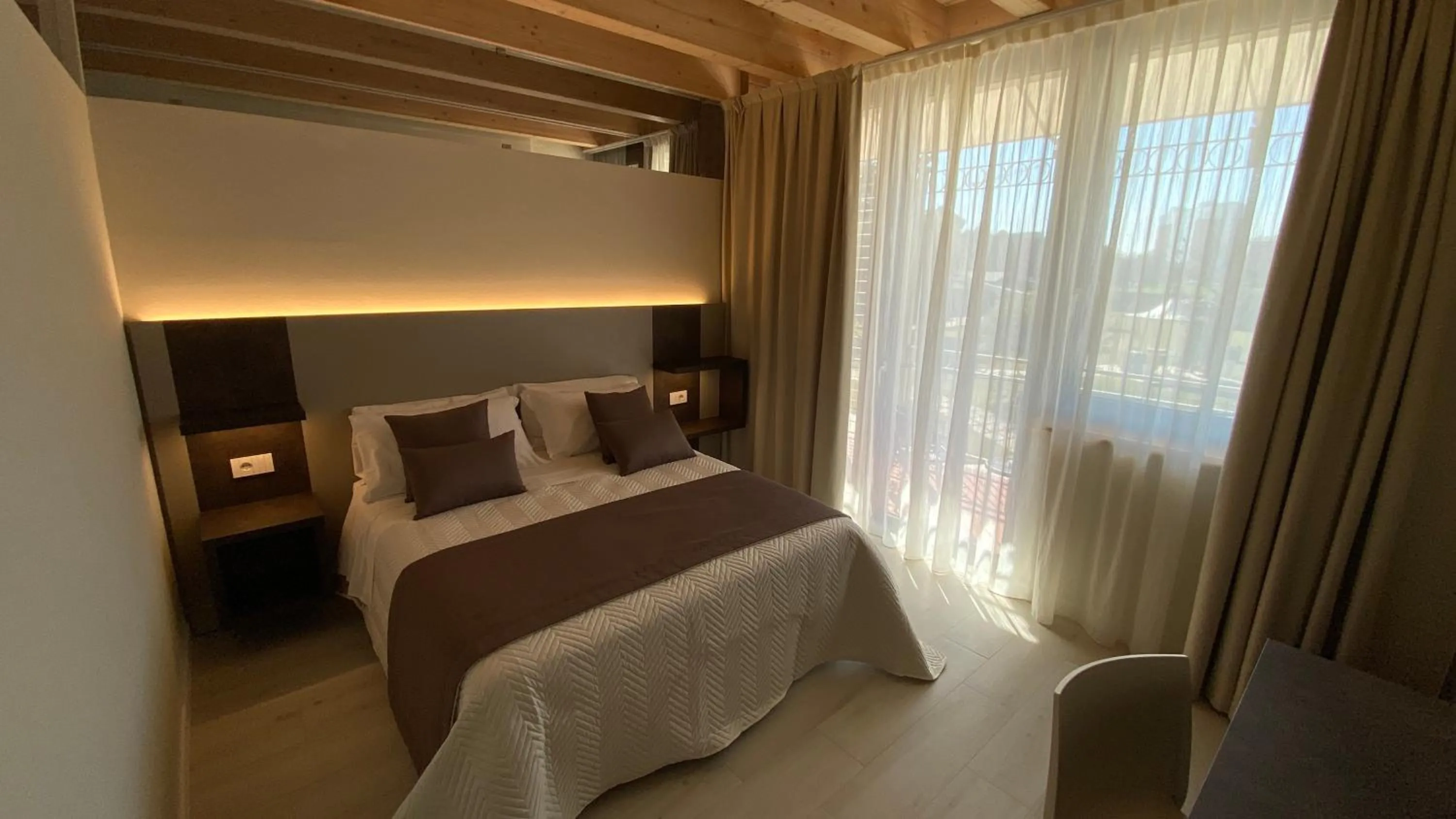 Bed in Cà dell'Orto Rooms & Apartments