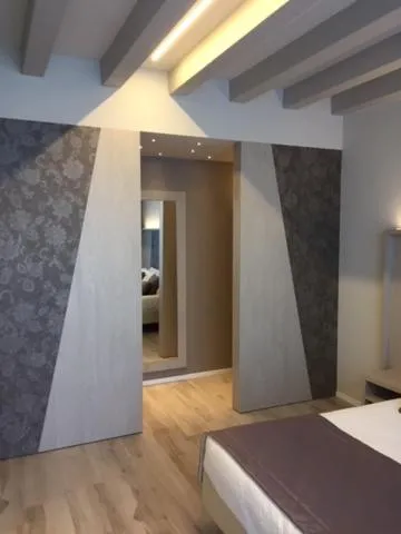 Bed in Cà dell'Orto Rooms & Apartments
