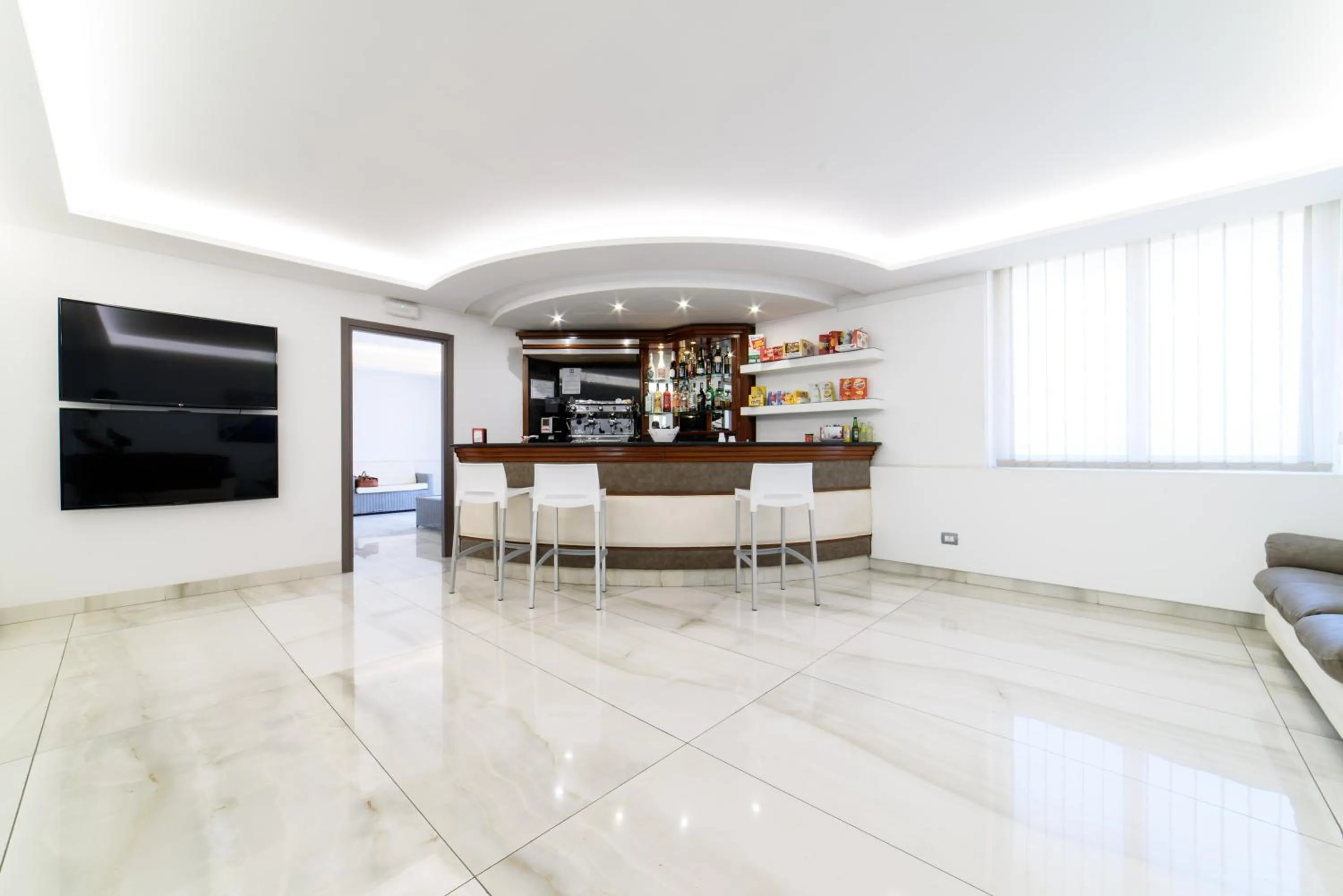 Lounge or bar in Hotel La Mela