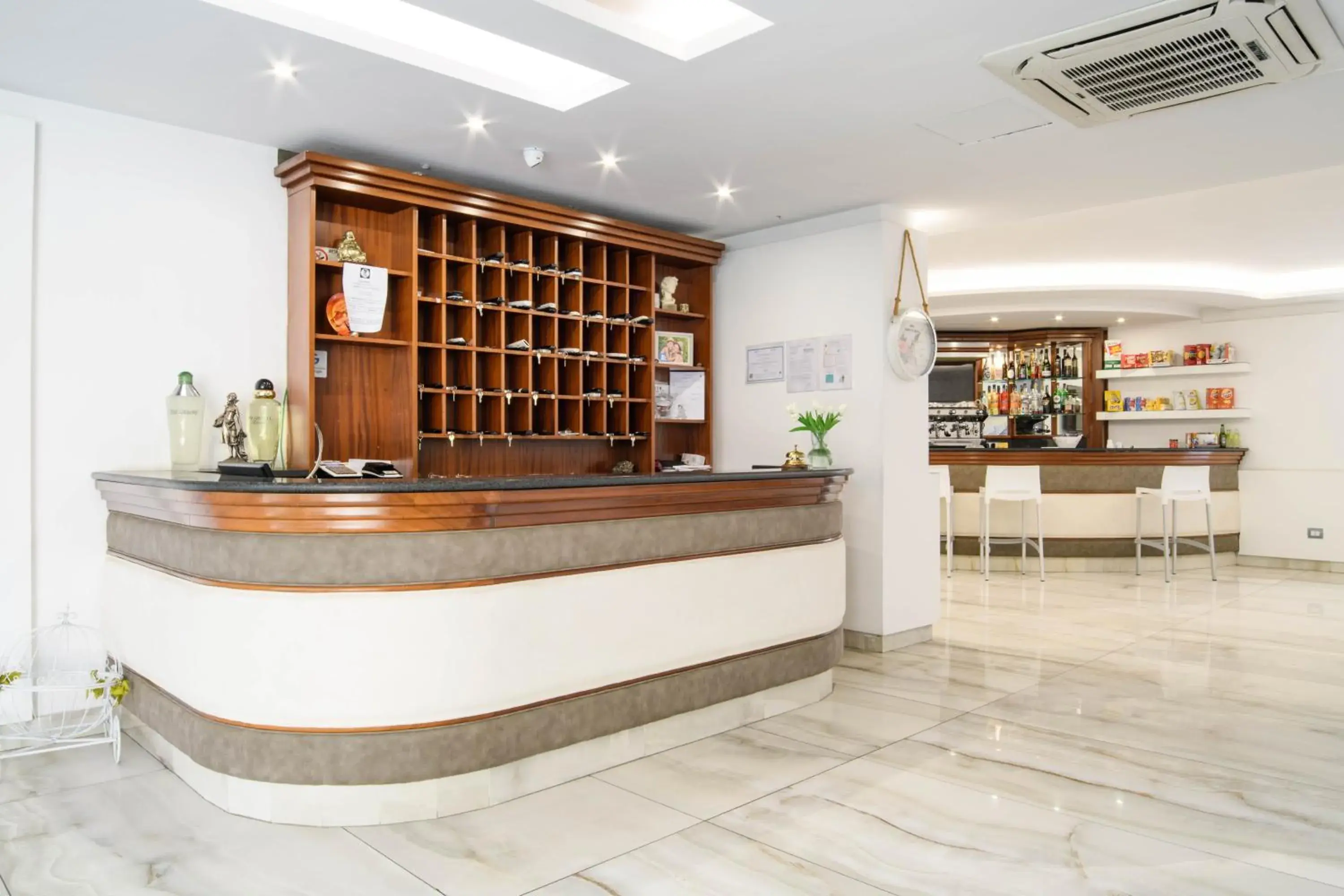 Lobby or reception in Hotel La Mela Lobby or reception in Hotel La Mela