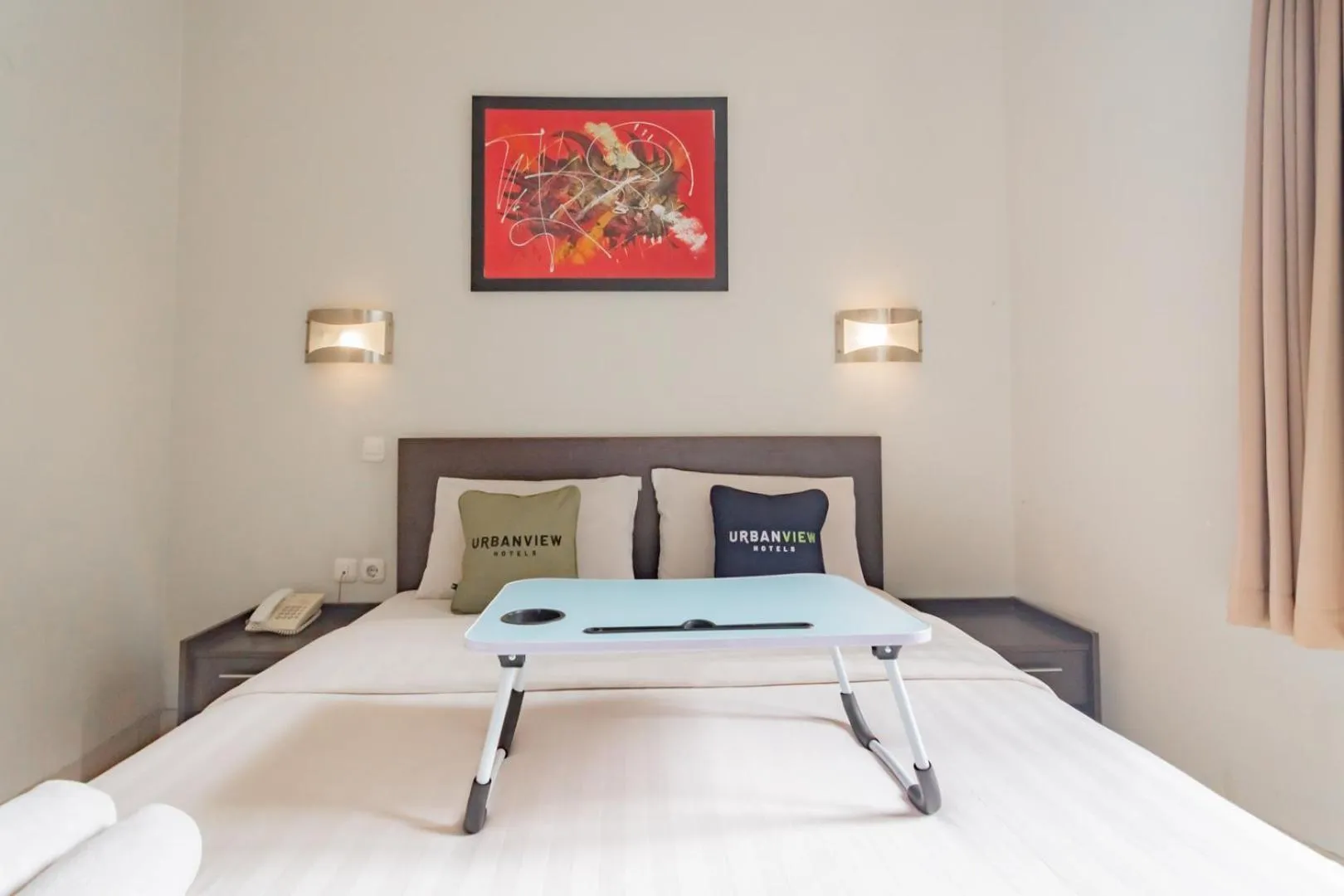 Photo of the whole room, Bed in Urbanview Hotel Grand Malabar Bandung