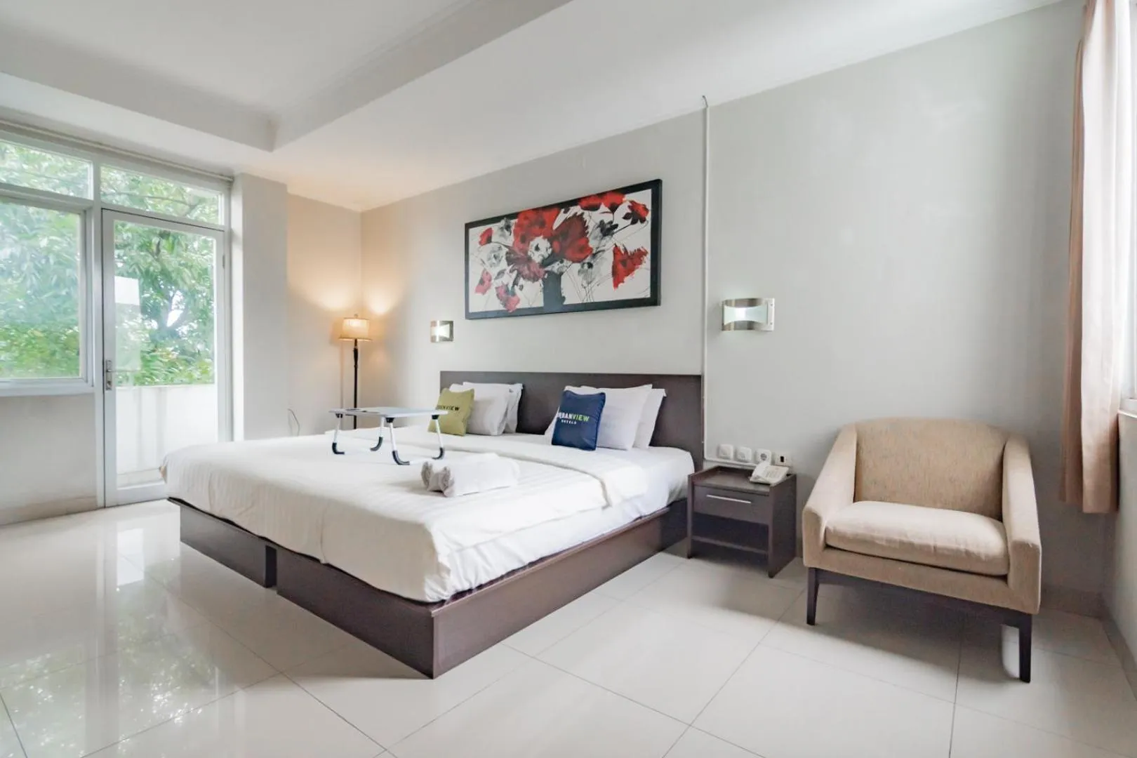Photo of the whole room, Bed in Urbanview Hotel Grand Malabar Bandung