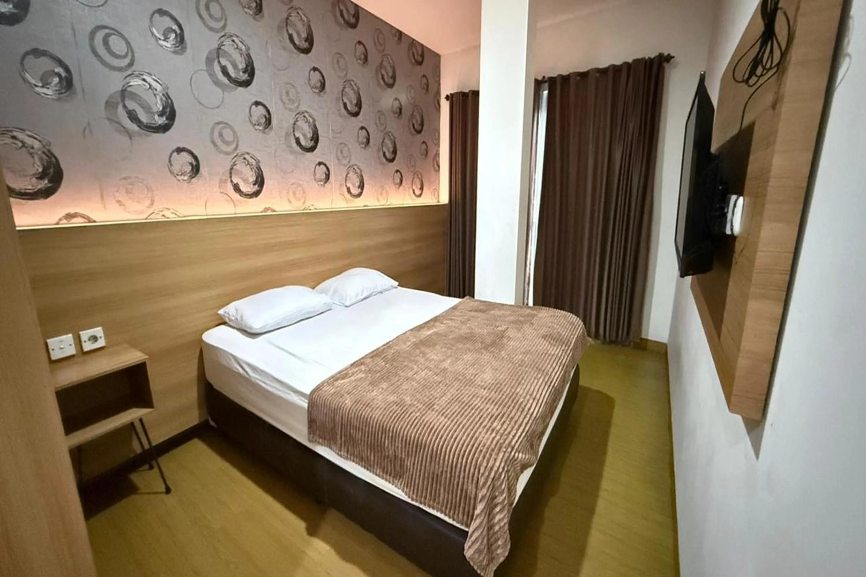 Bed in Senayan Suites