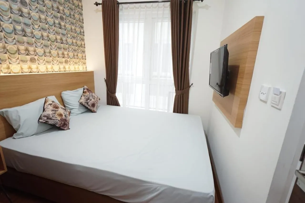 Bedroom in SENAYAN SUITES