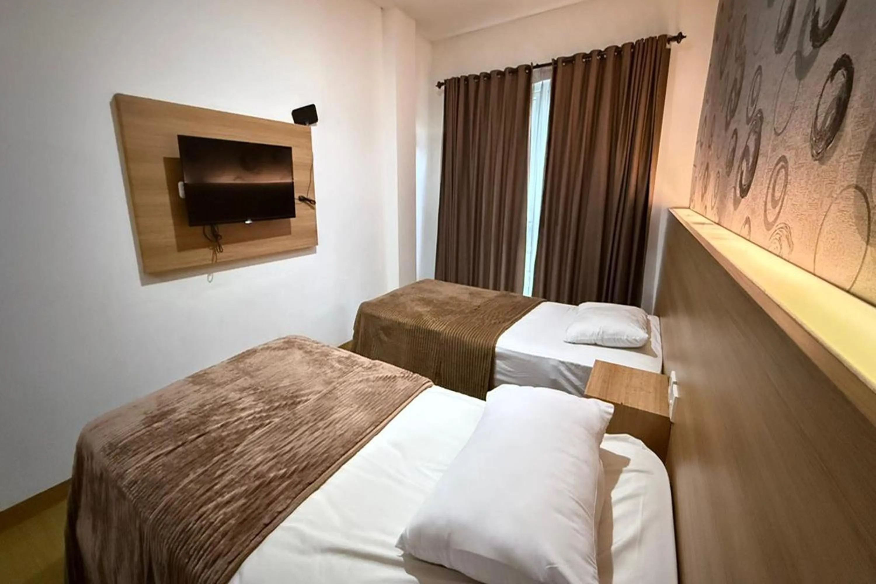 Bed in Senayan Suites