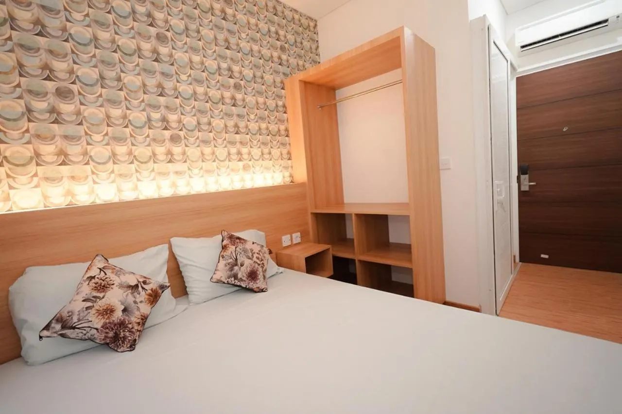 Bed in SENAYAN SUITES