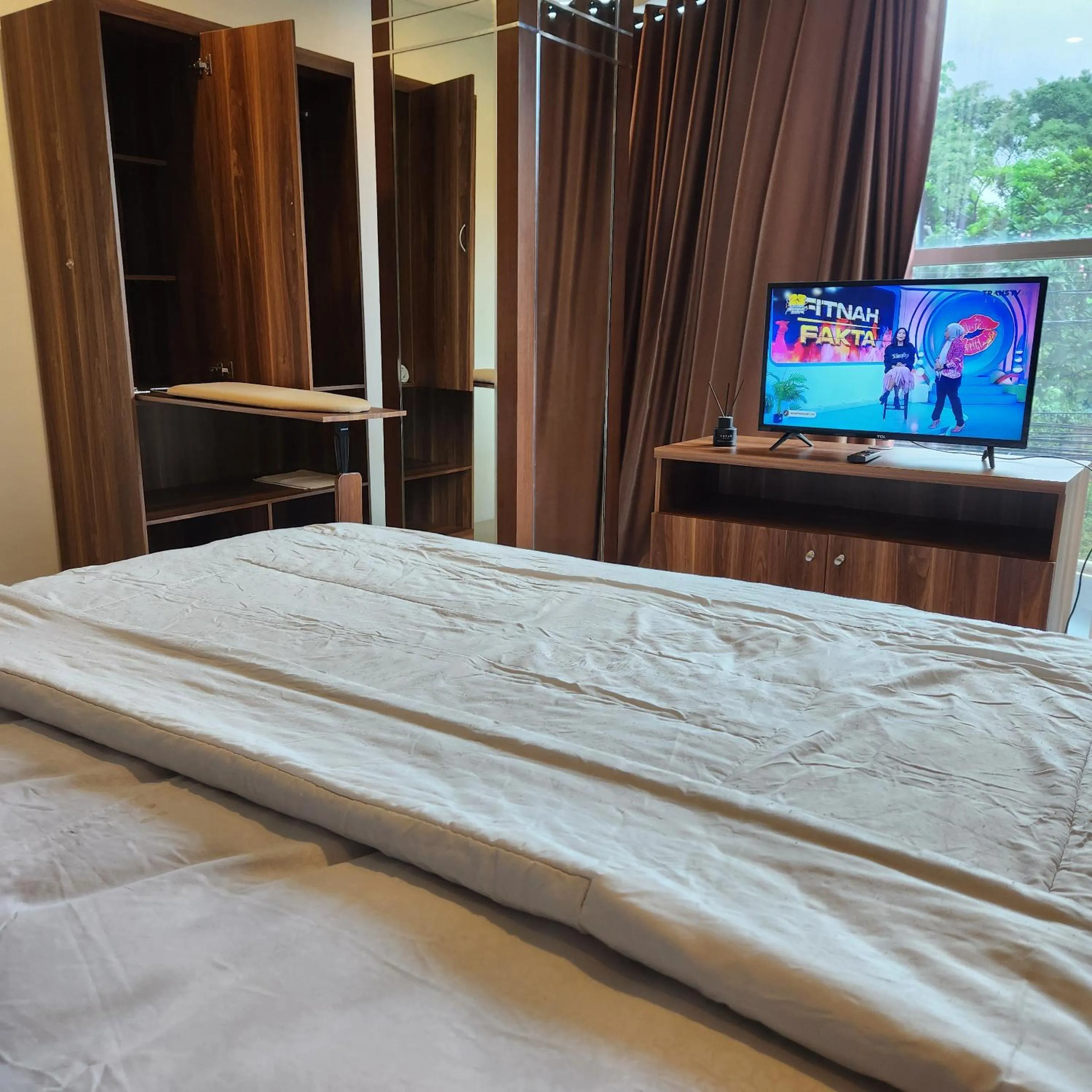 Bedroom in SENAYAN SUITES