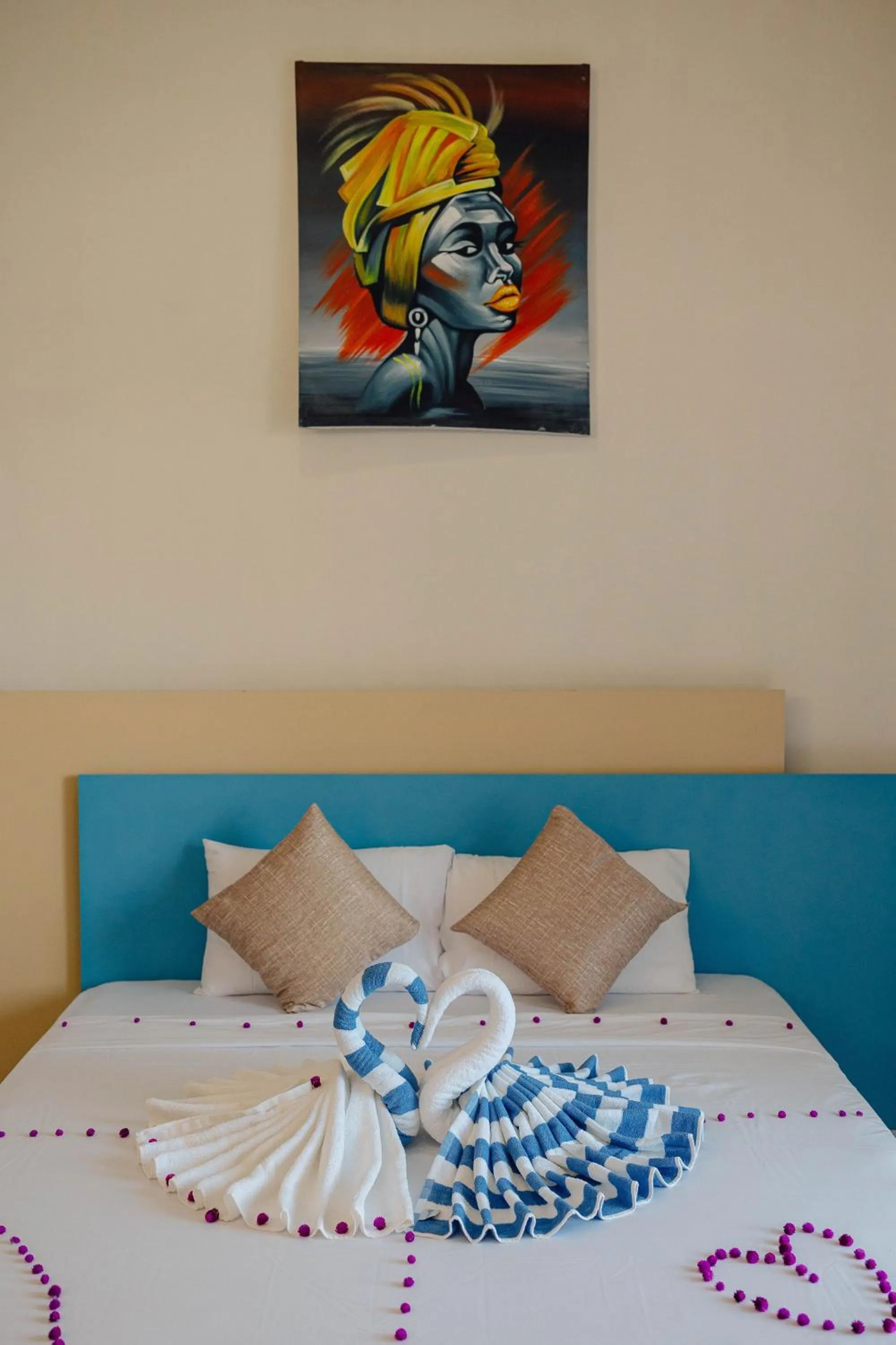 Bed in Ocean Breeze Hotel