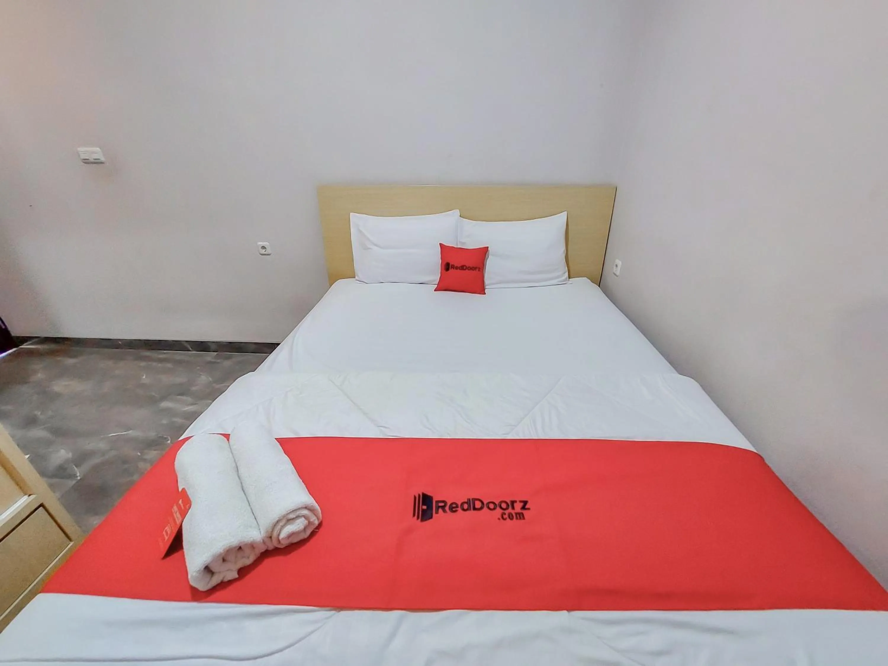 Bedroom in Reddoorz at Cempaka Guesthouse Tarakan