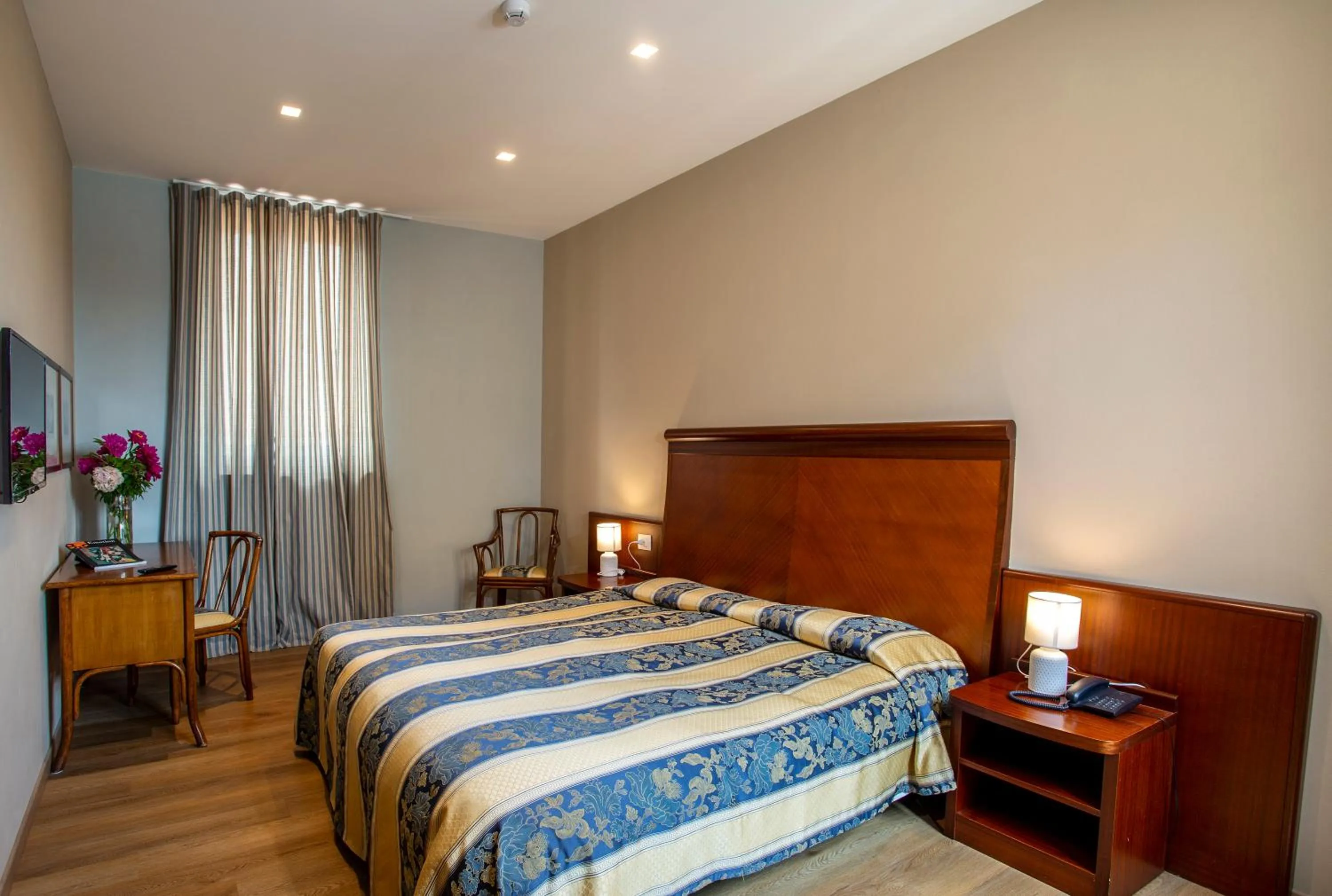 Bed in Europalace Hotel