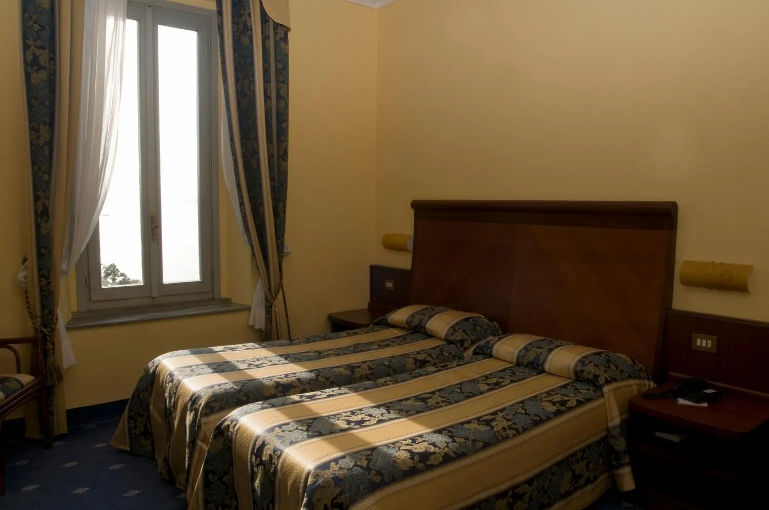 Bed in Europalace Hotel