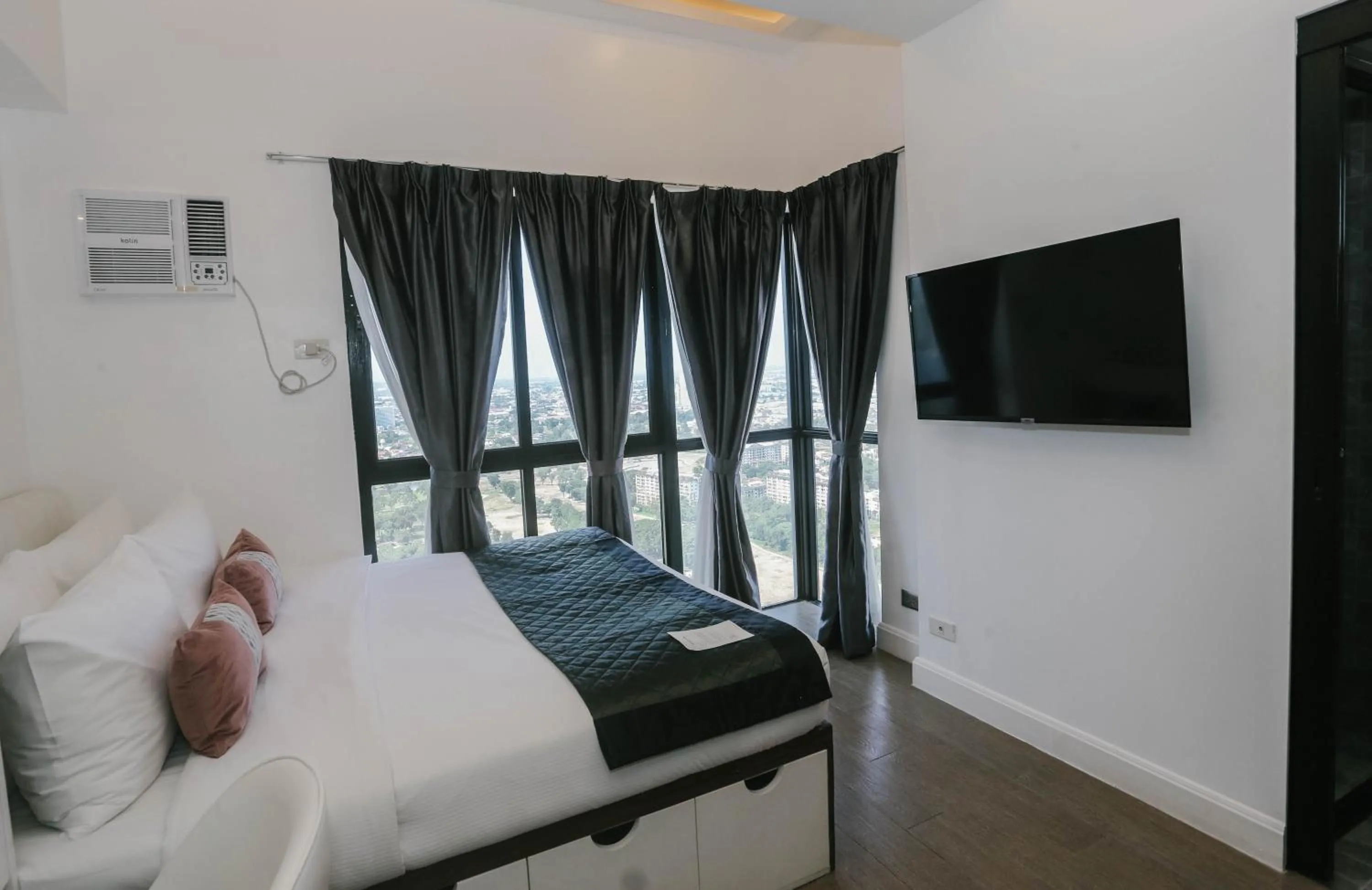 Bed in Noble Cebu Hotel