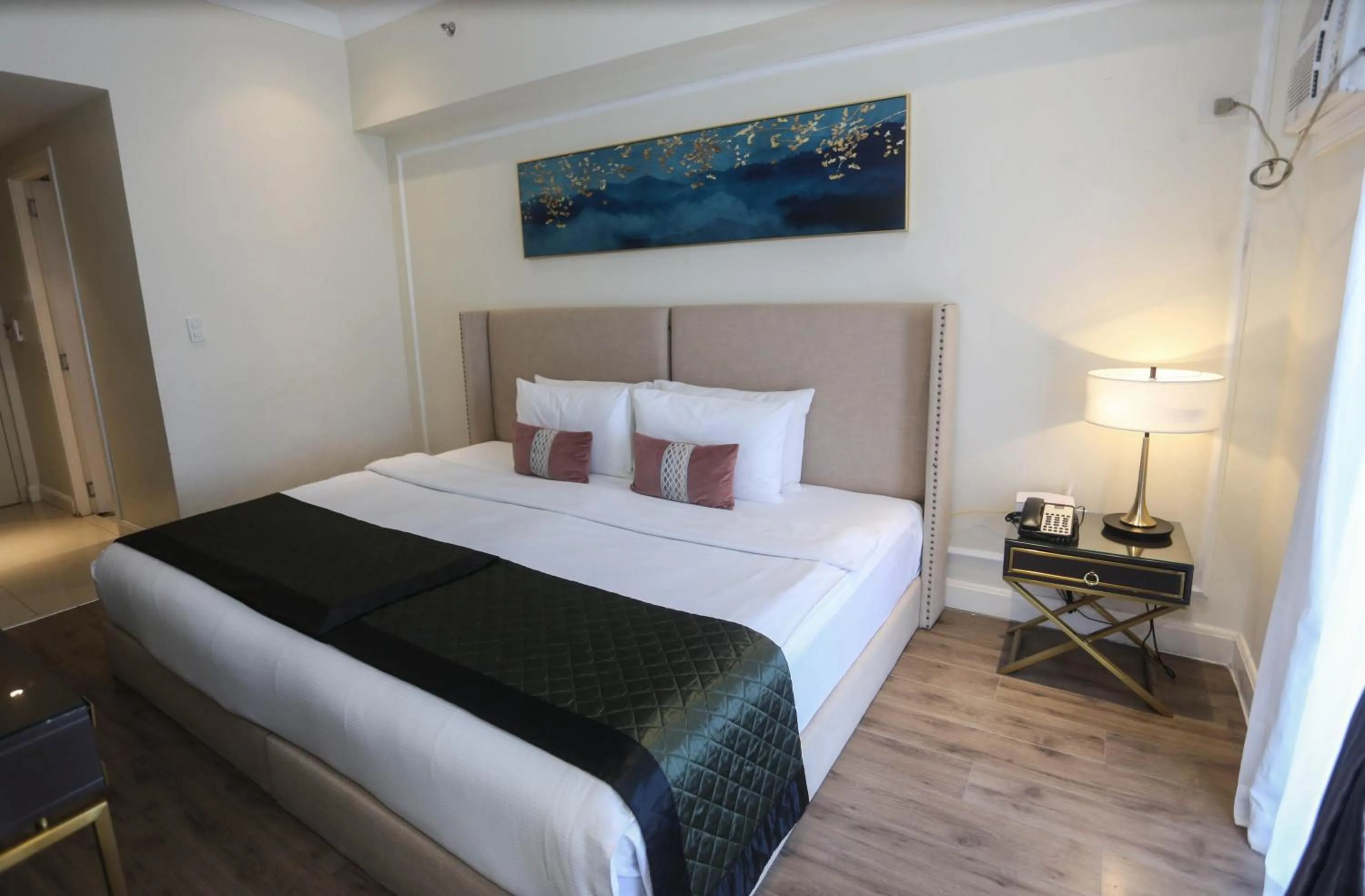 Bed in Noble Cebu Hotel