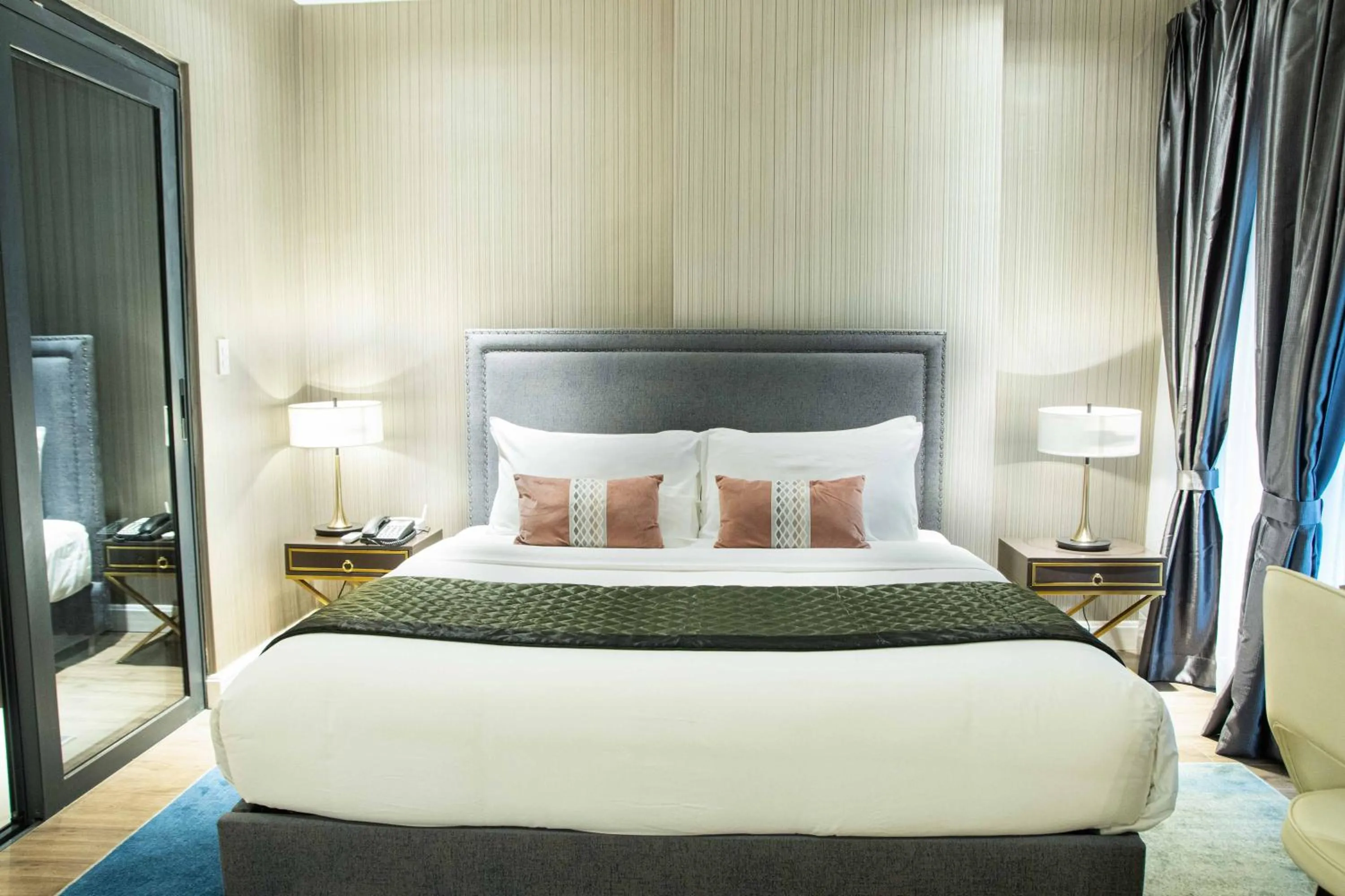 Bed in Noble Cebu Hotel