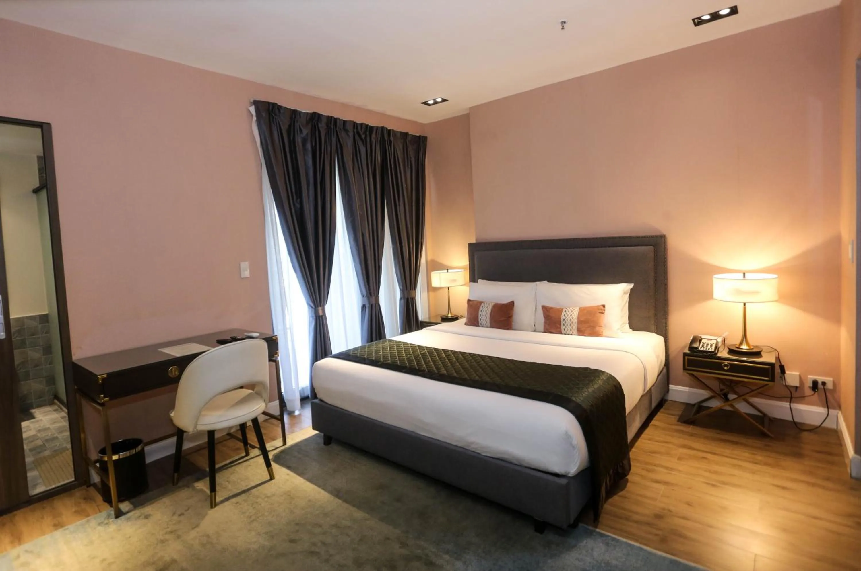 Bed in Noble Cebu Hotel