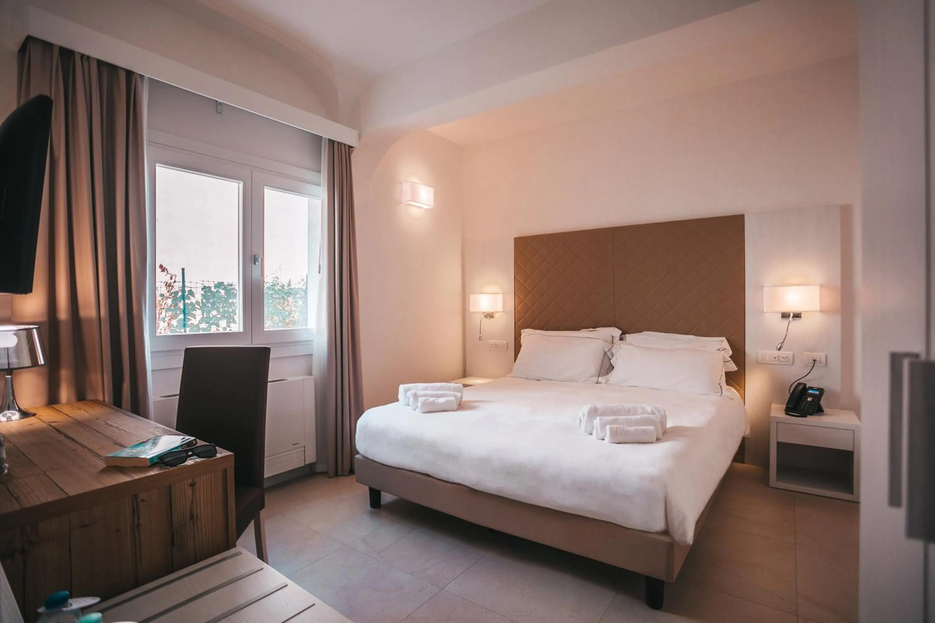 Bed in Hotel Moresco