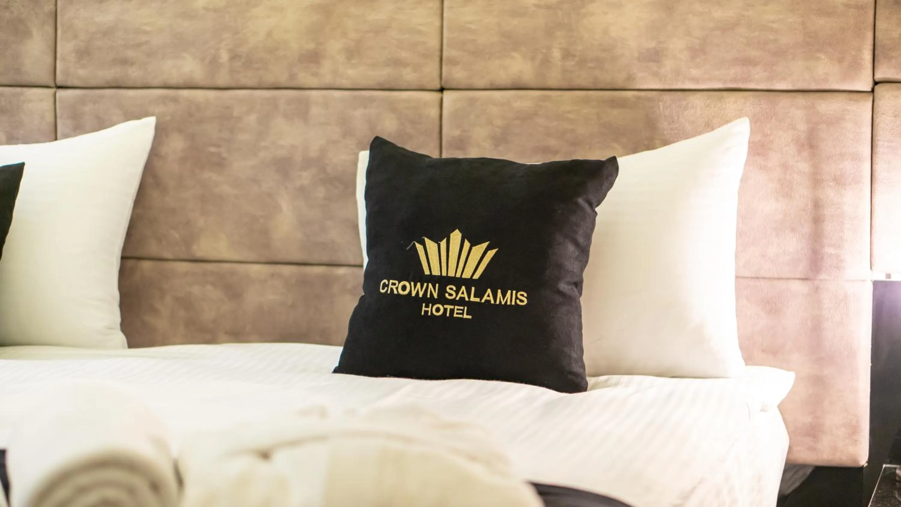 Bed in Crown Salamis Hotel