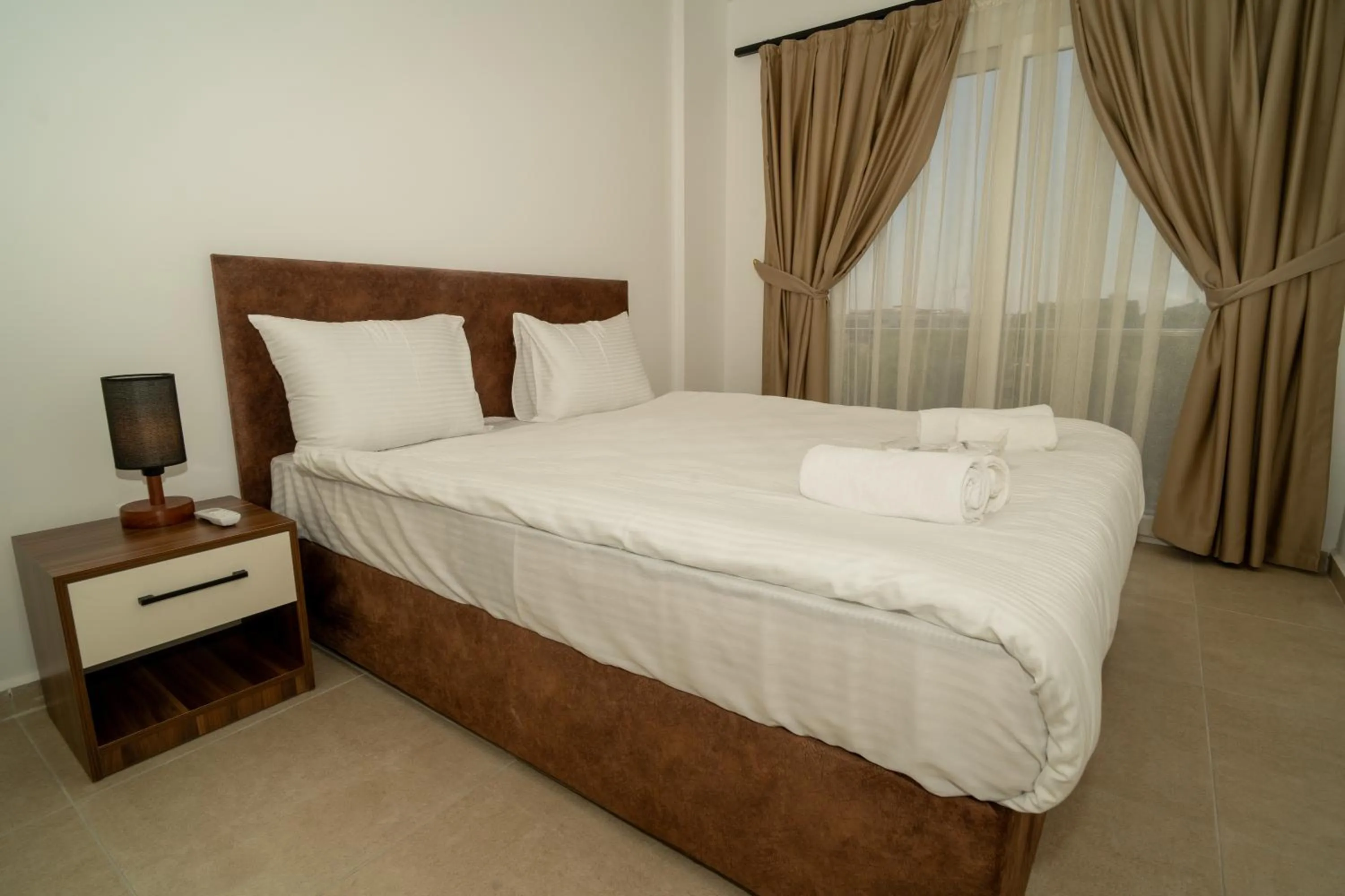 Bed in Crown Salamis Hotel