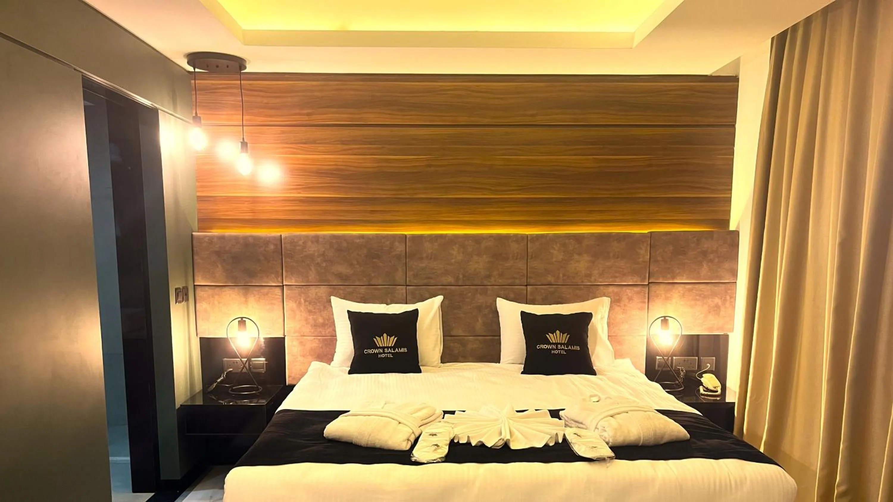 Bed in Crown Salamis Hotel