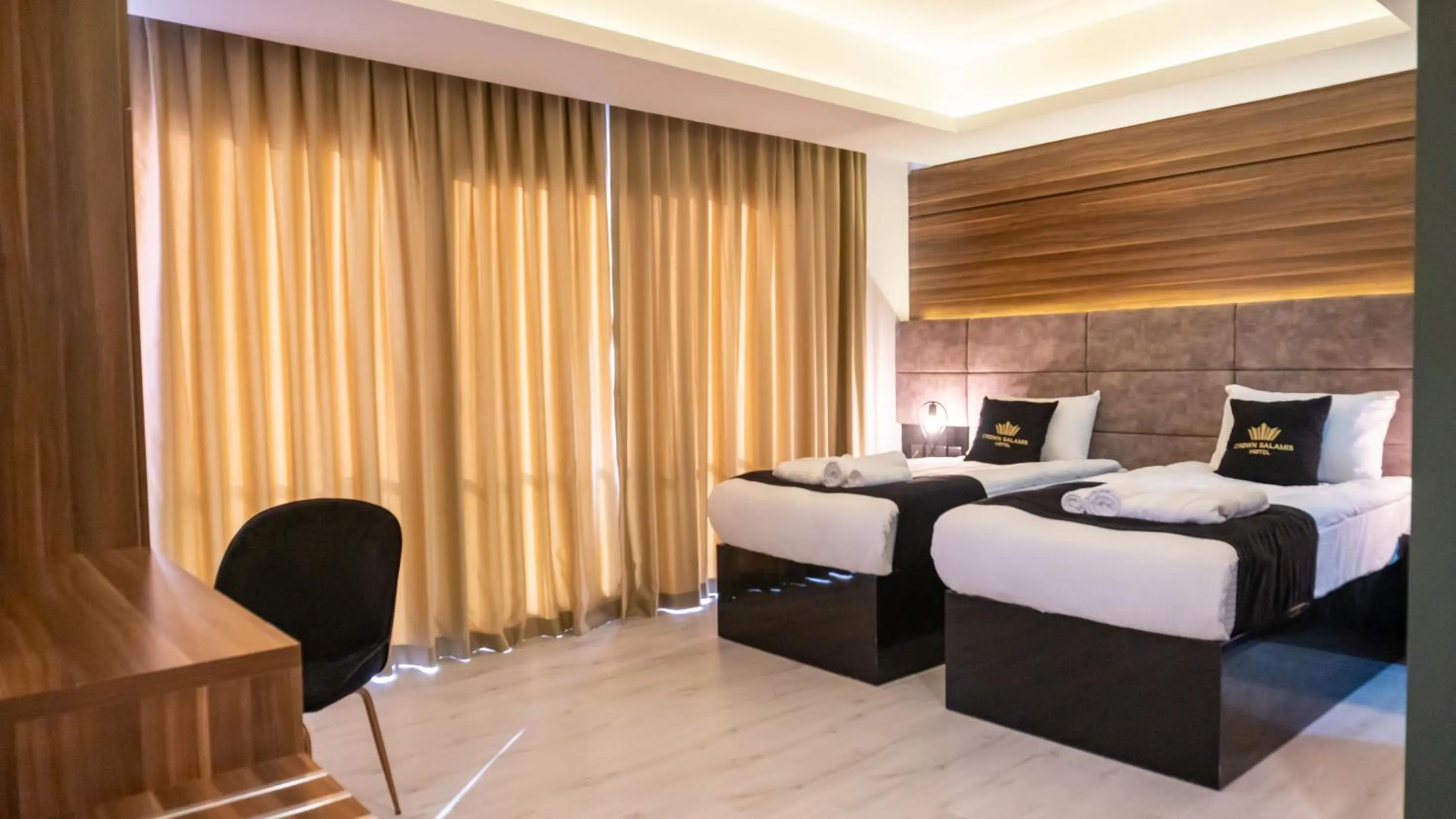 Bed in Crown Salamis Hotel