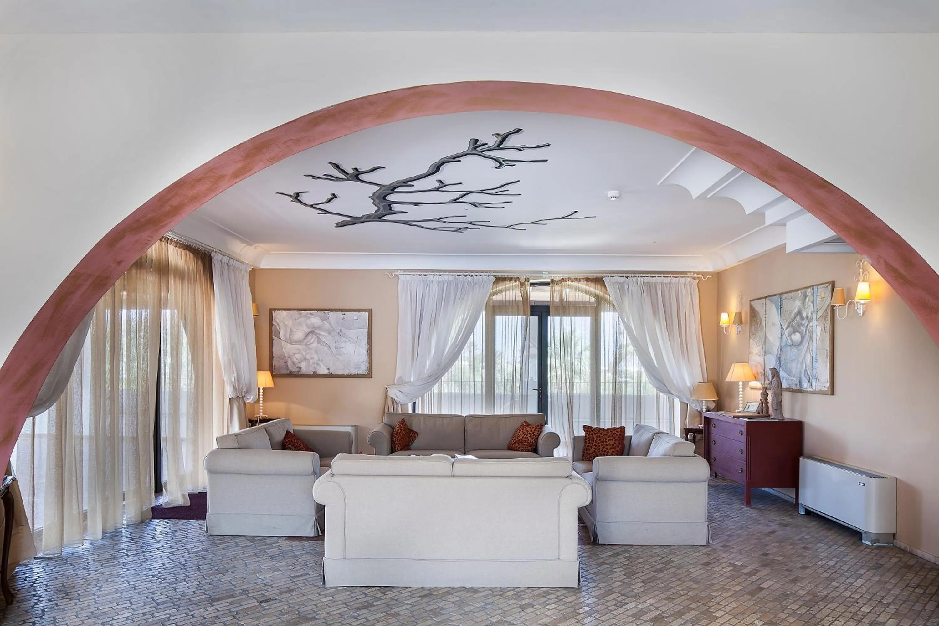 Communal lounge/ TV room in Hotel Garden