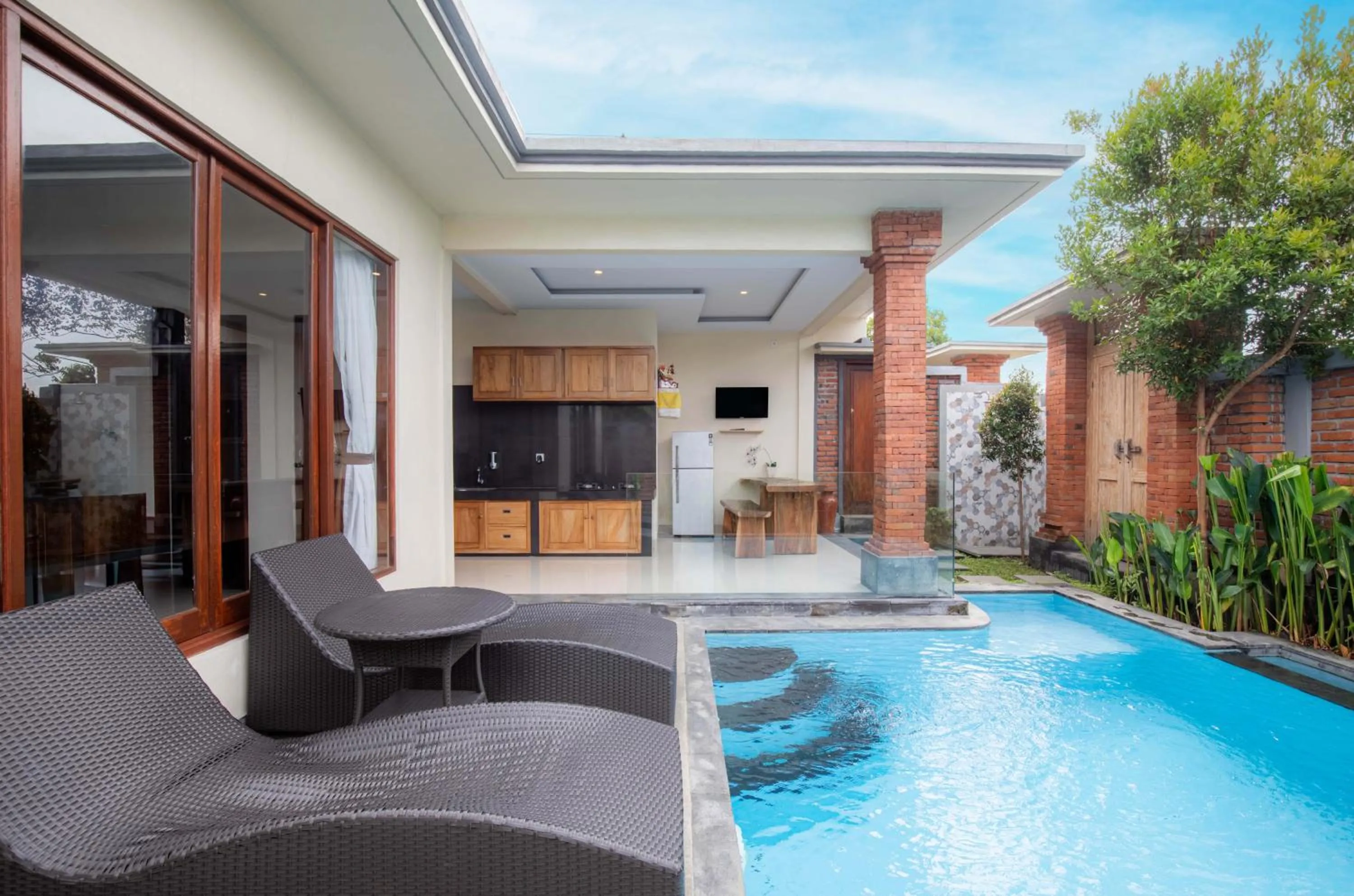 Communal lounge/ TV room in Ubud Mayura Private Pool Villa