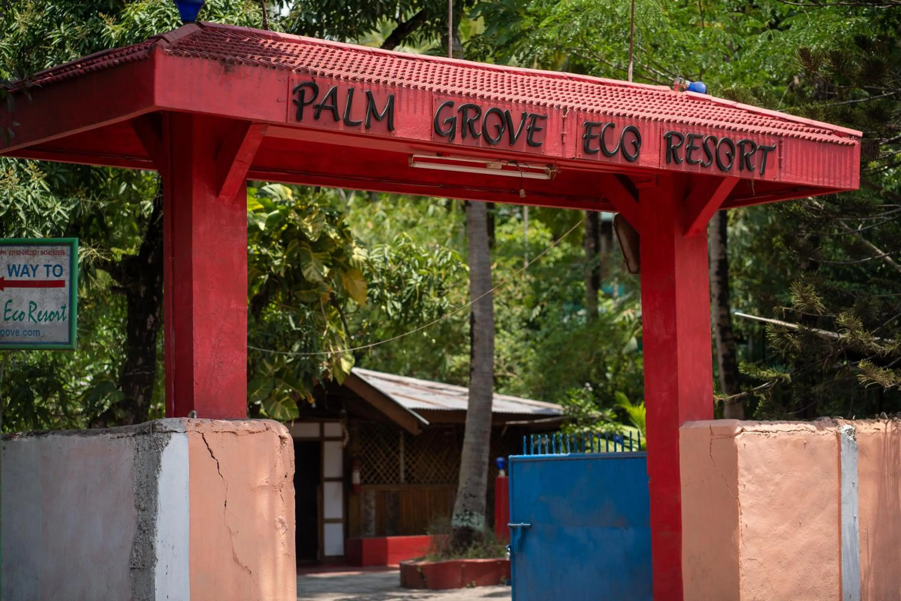Facade/entrance in Palm Grove Eco Resort
