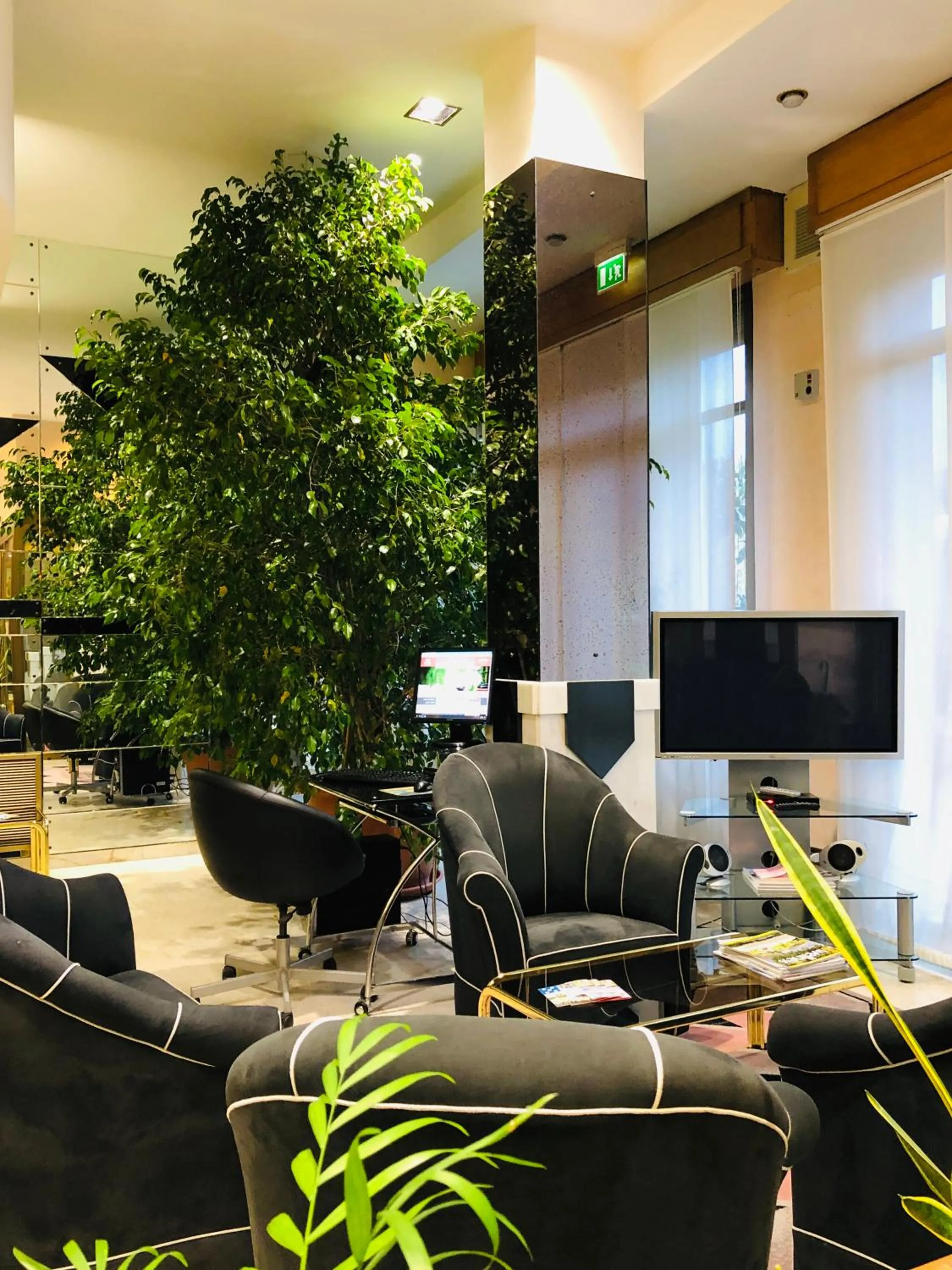 Communal lounge/ TV room in Grand Hotel Ambasciatori Wellness & Spa