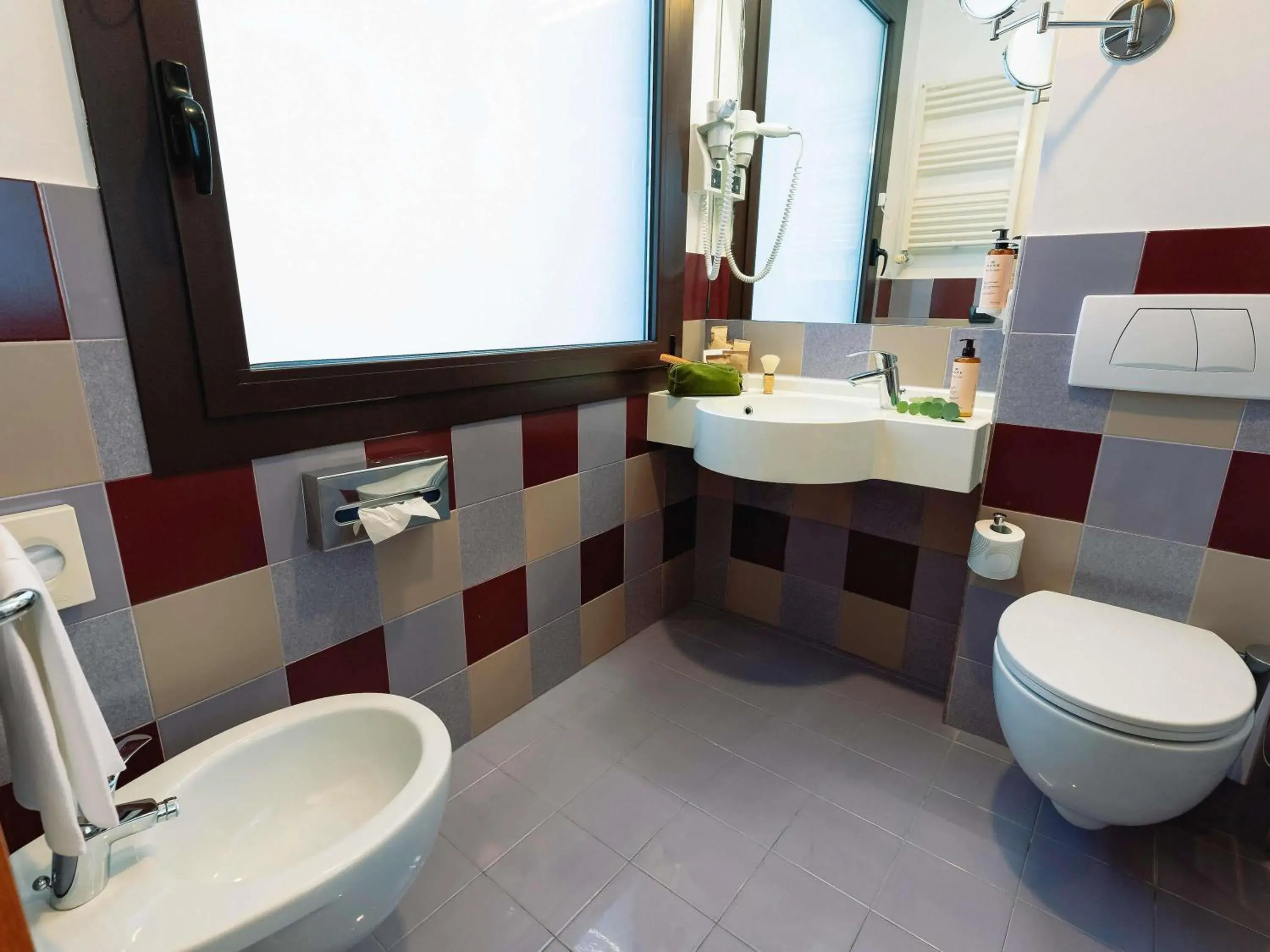 Bedroom in Mercure Roma Piazza Bologna Bedroom in Mercure Roma Piazza Bologna