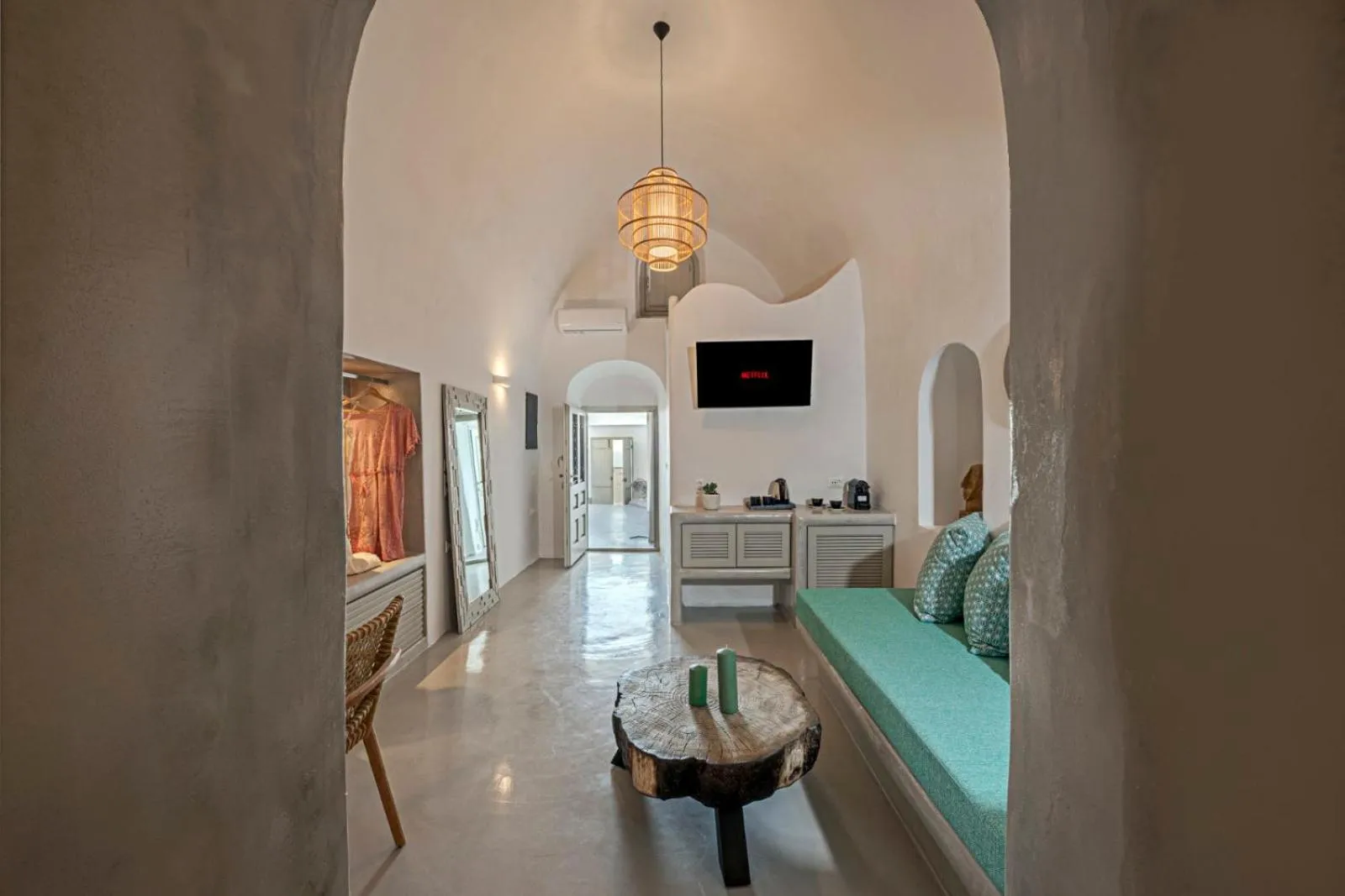 Living room, Bed in Kaleidoscope Imerovigli Suites