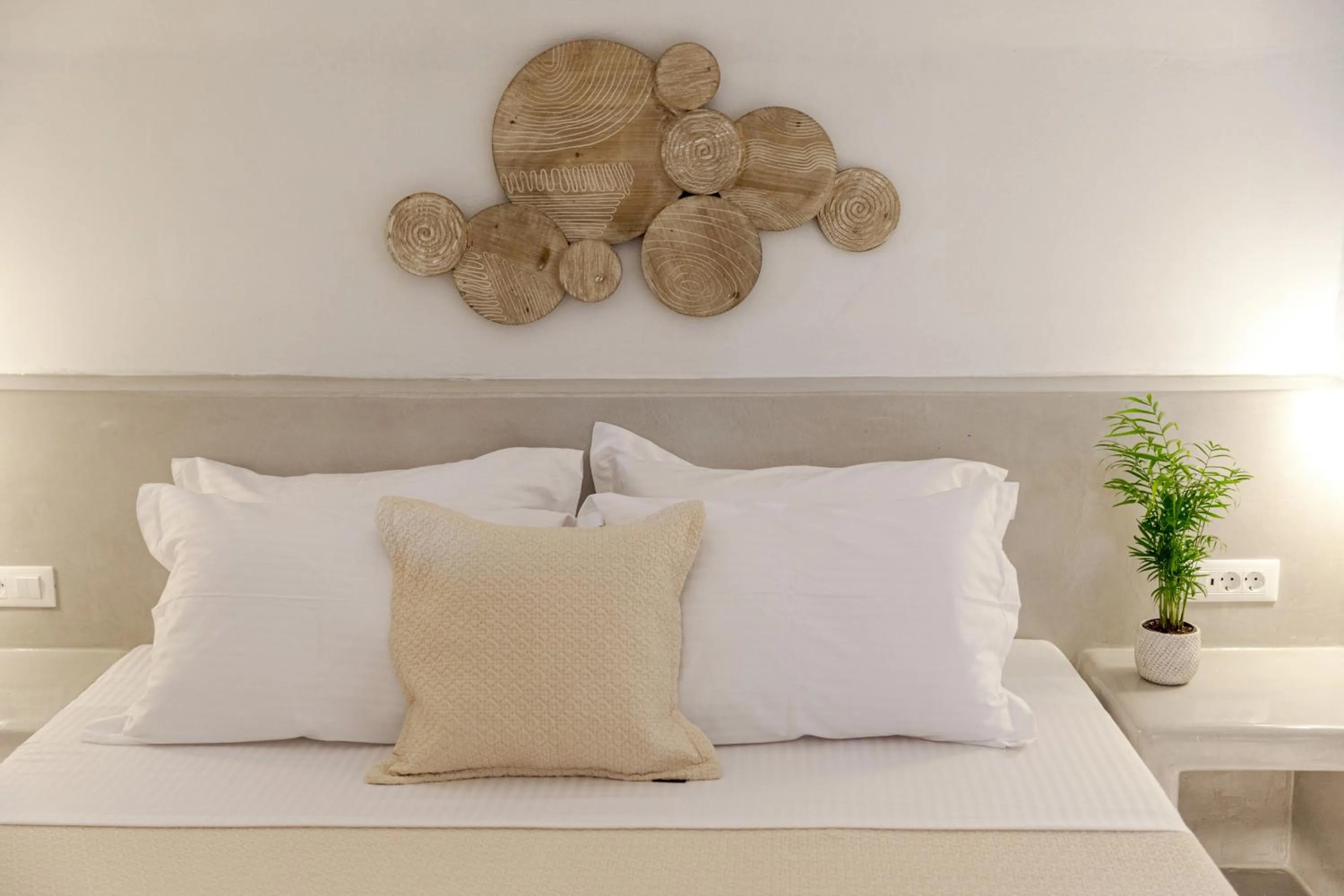 Bed in Kaleidoscope Imerovigli Suites