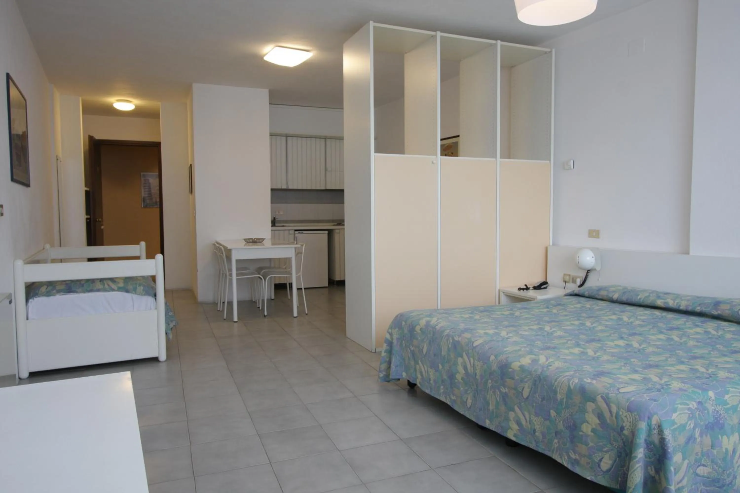 Kitchen or kitchenette, Bed in Grand Hotel Golf