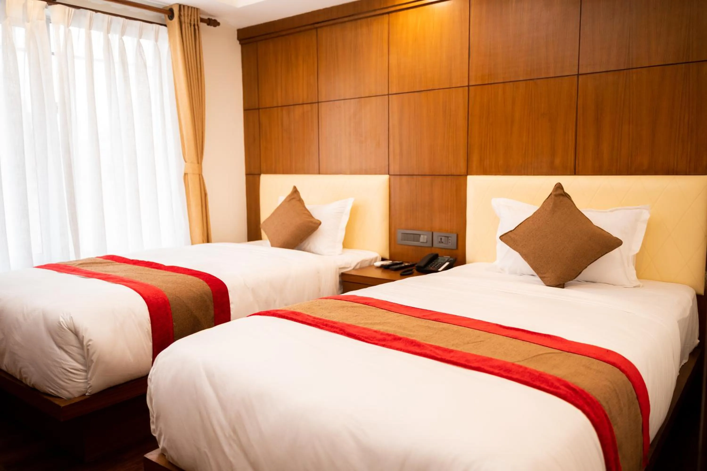 Bed in Hotel Kailash Kutee