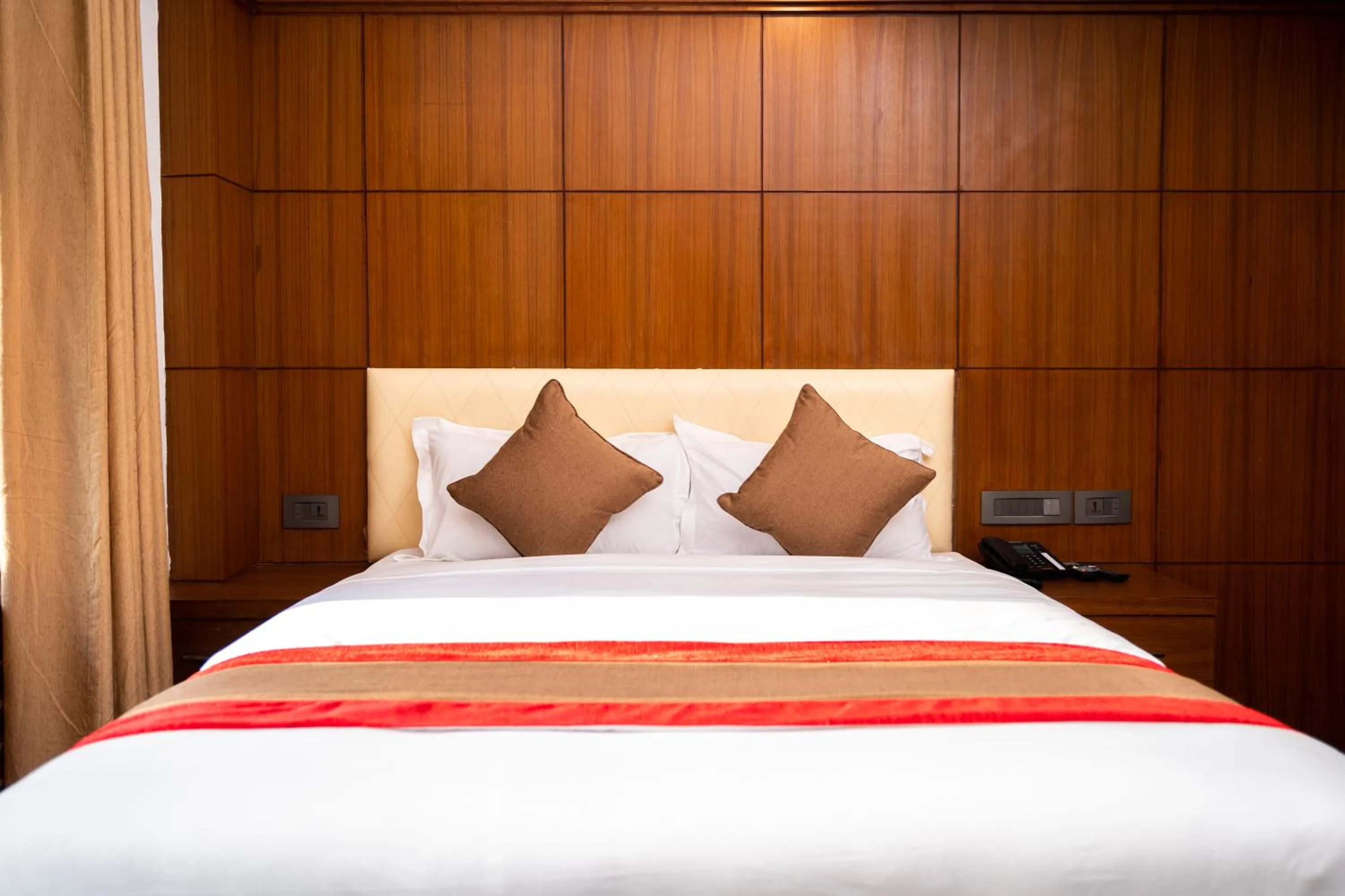 Bed in Hotel Kailash Kutee