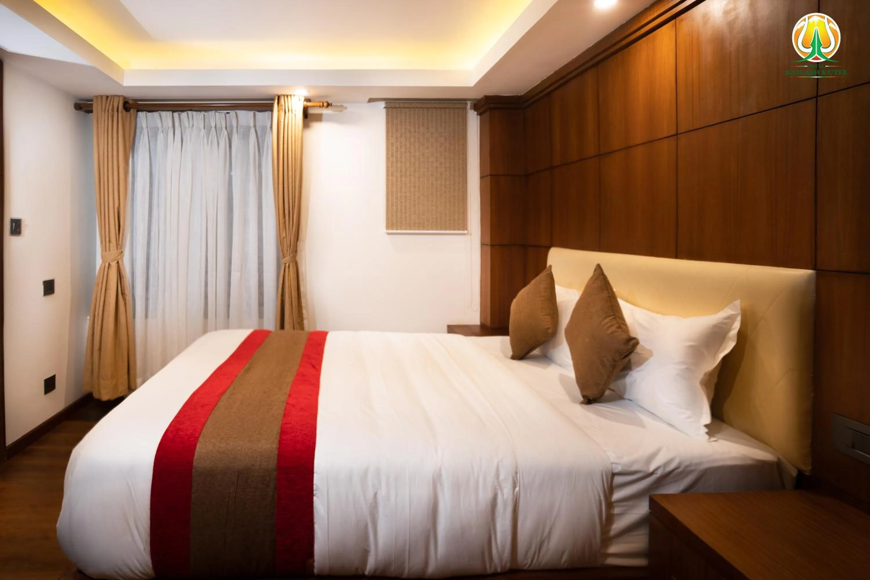 Bed in Hotel Kailash Kutee