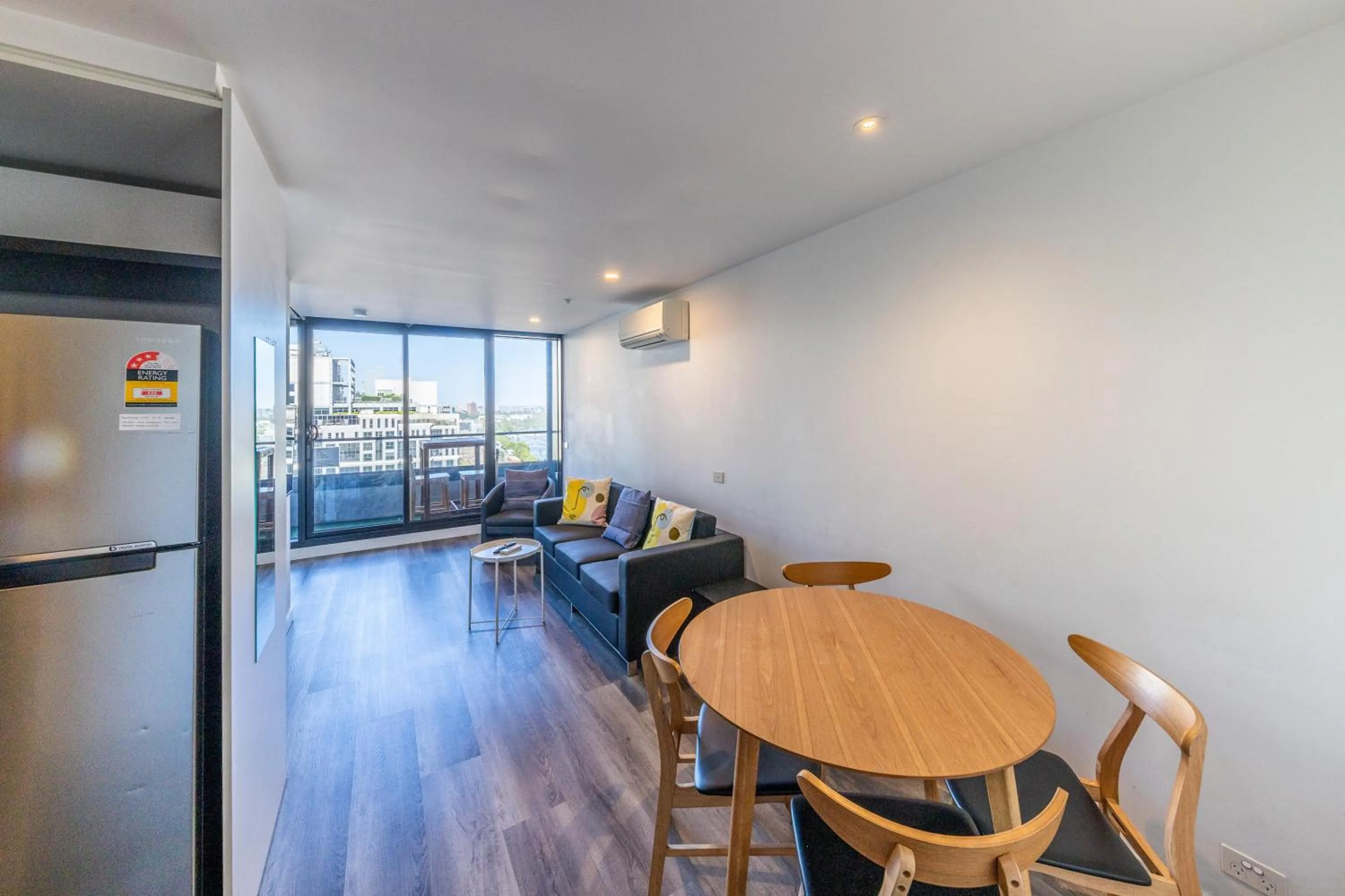 Living room in Aura2107, CBD Entire 2 Bedroom Apartment with Balcony and Stunning Yarra River Views