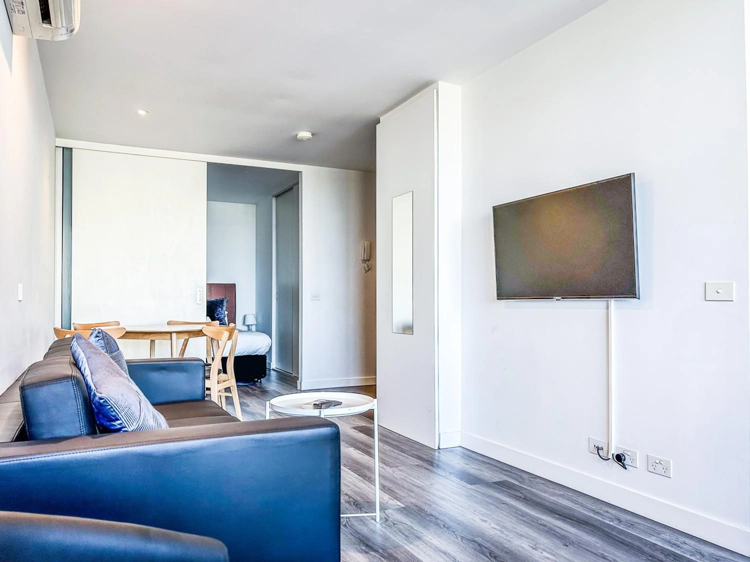TV and multimedia in Aura2107, CBD Entire 2 Bedroom Apartment with Balcony and Stunning Yarra River Views