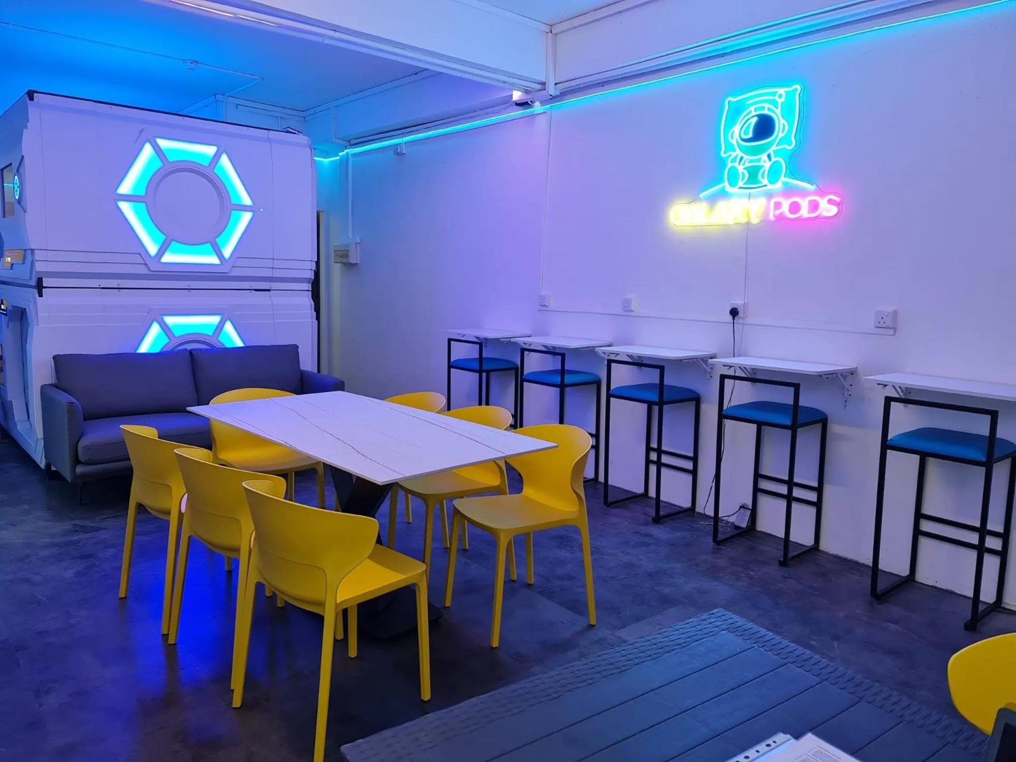 Communal lounge/ TV room in Galaxy Pods Capsule Hotel Boat Quay