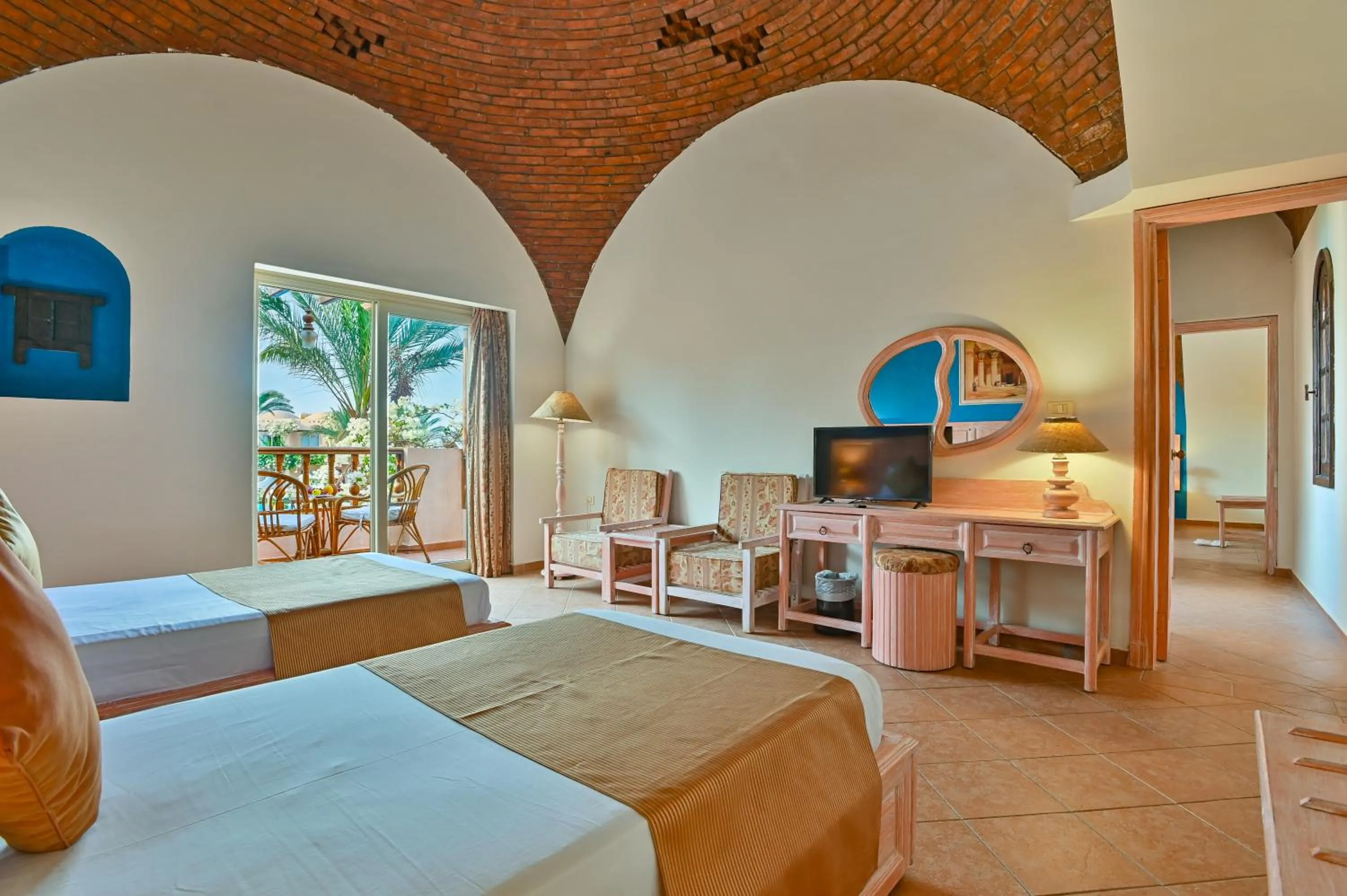 Communal lounge/ TV room, Bed in Dream Lagoon Resort & Aqua Park